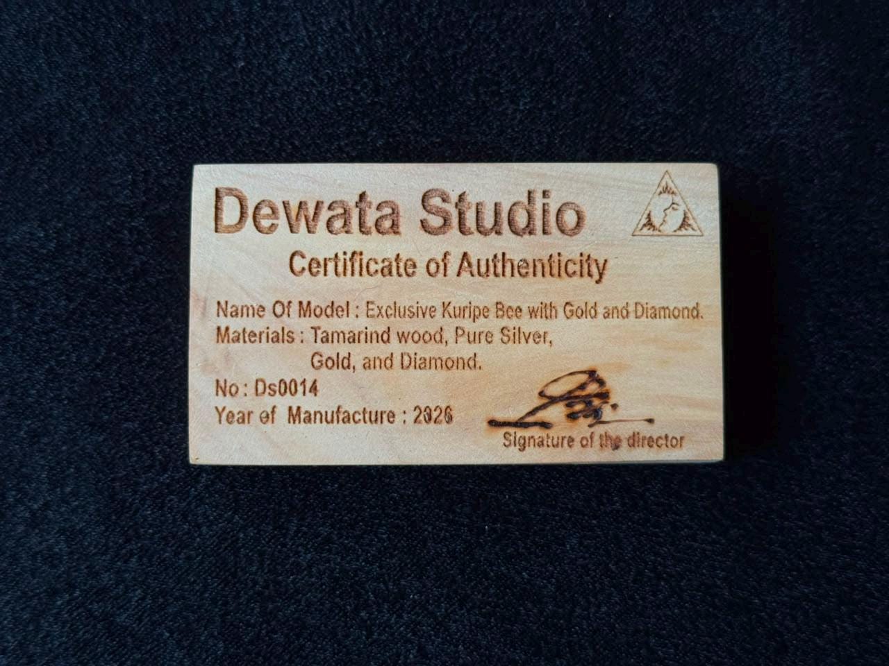 an authenticity certificate confirming the authenticity of the piece by Dewata Studio