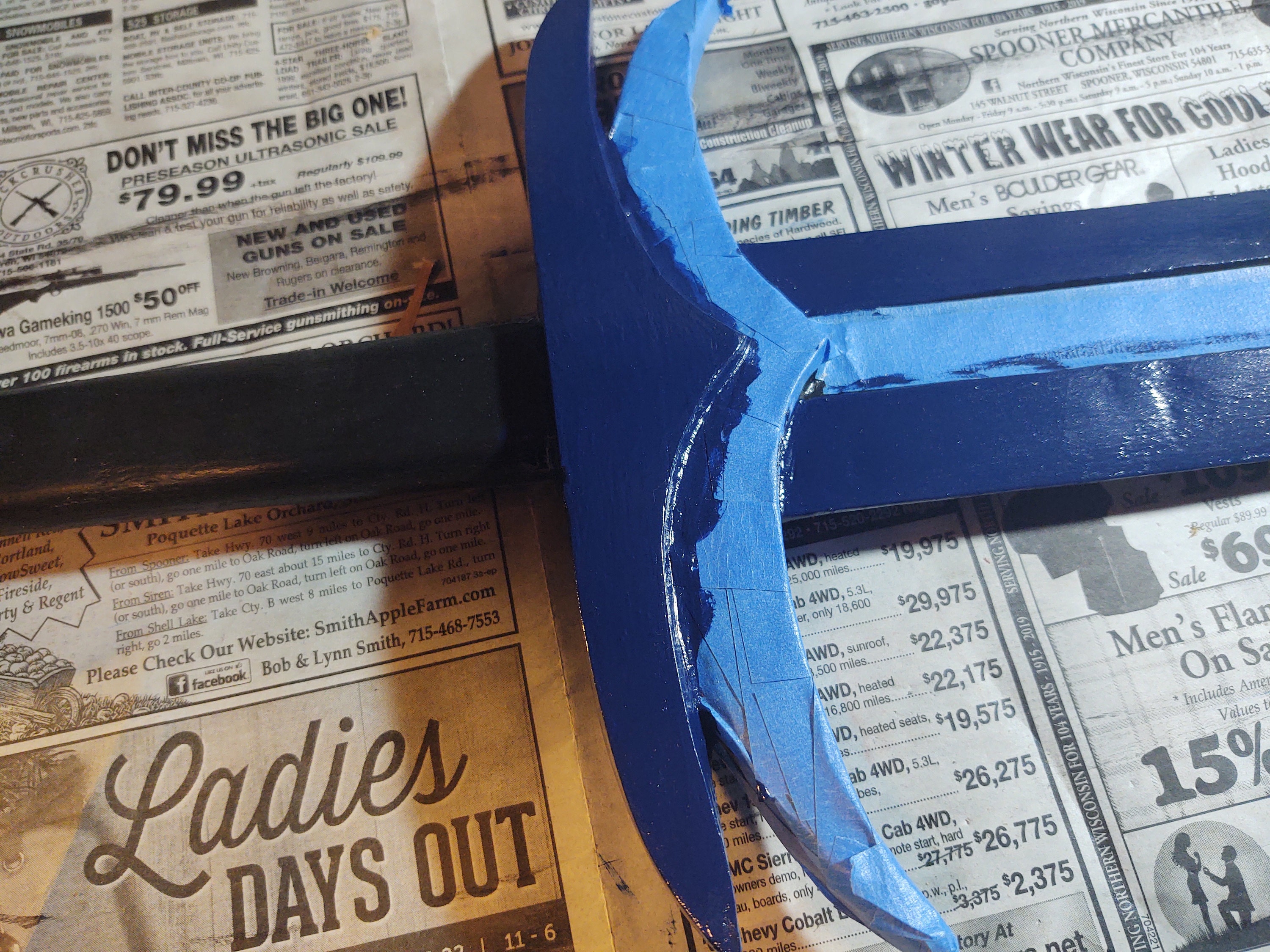 After carefully setting the painters tape in place, I began layering Navy Blue Gloss