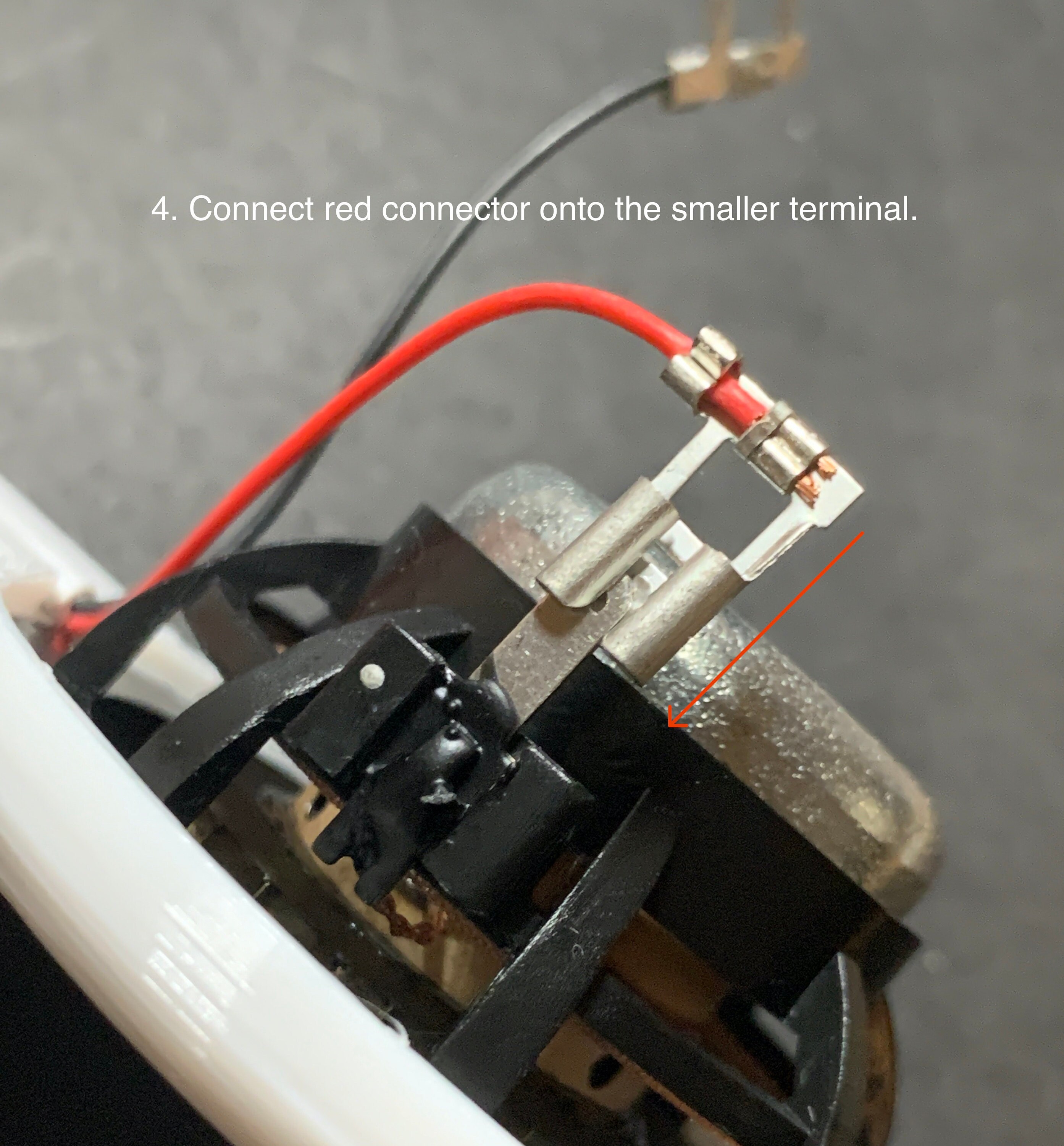4. Connect red connector onto the smaller terminal.
