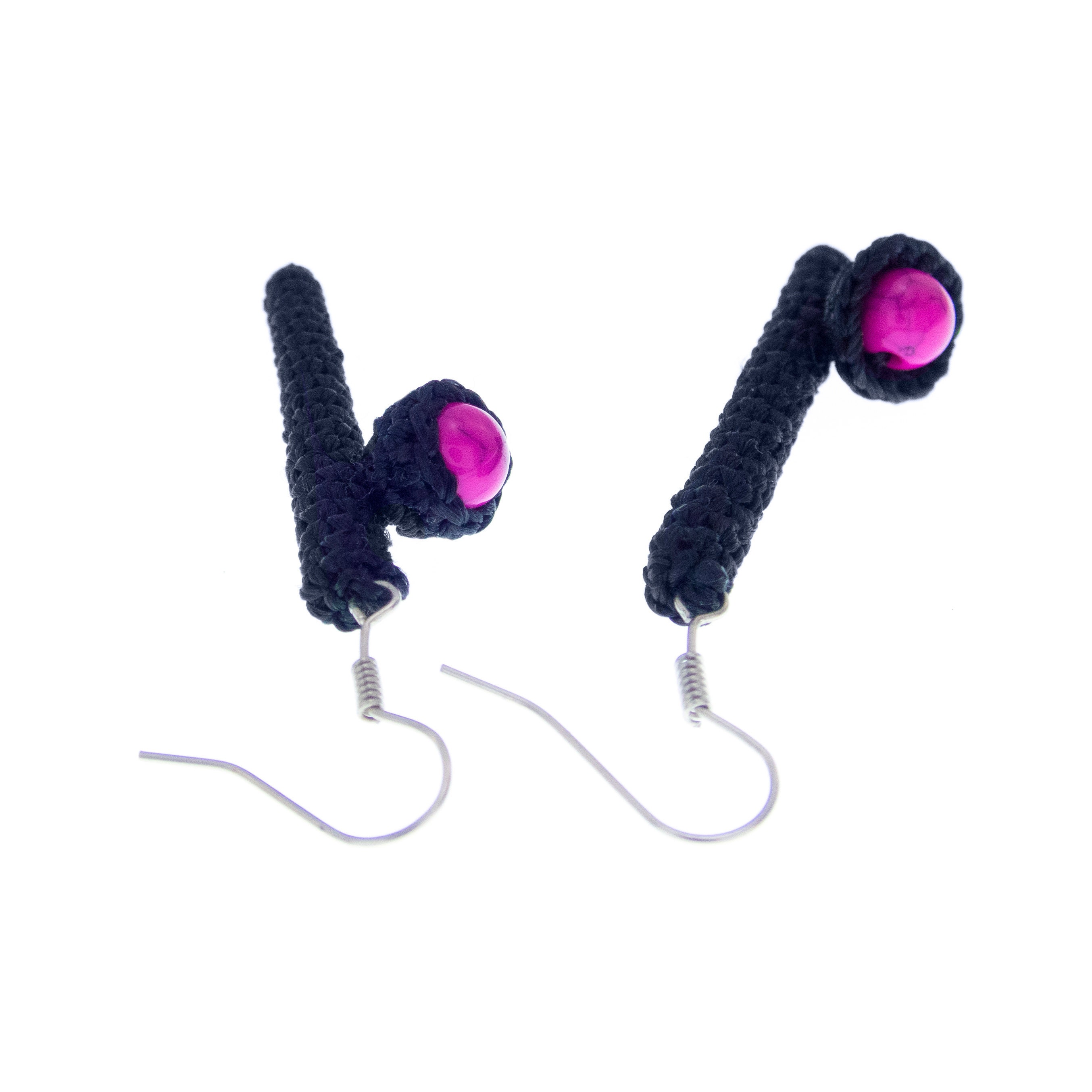 handmade mismatched earrings dangle in black and pink