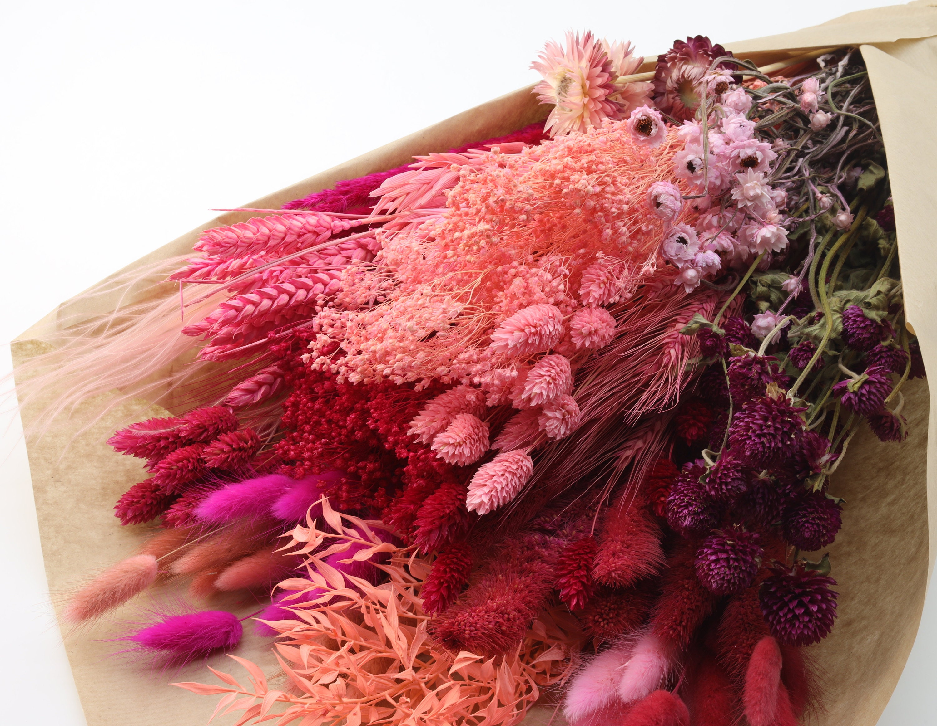 Pink lagurus grass, light pink wheat, bright pink ruscus, pale pink ammobium, strawflowers, phalaris dried grass,