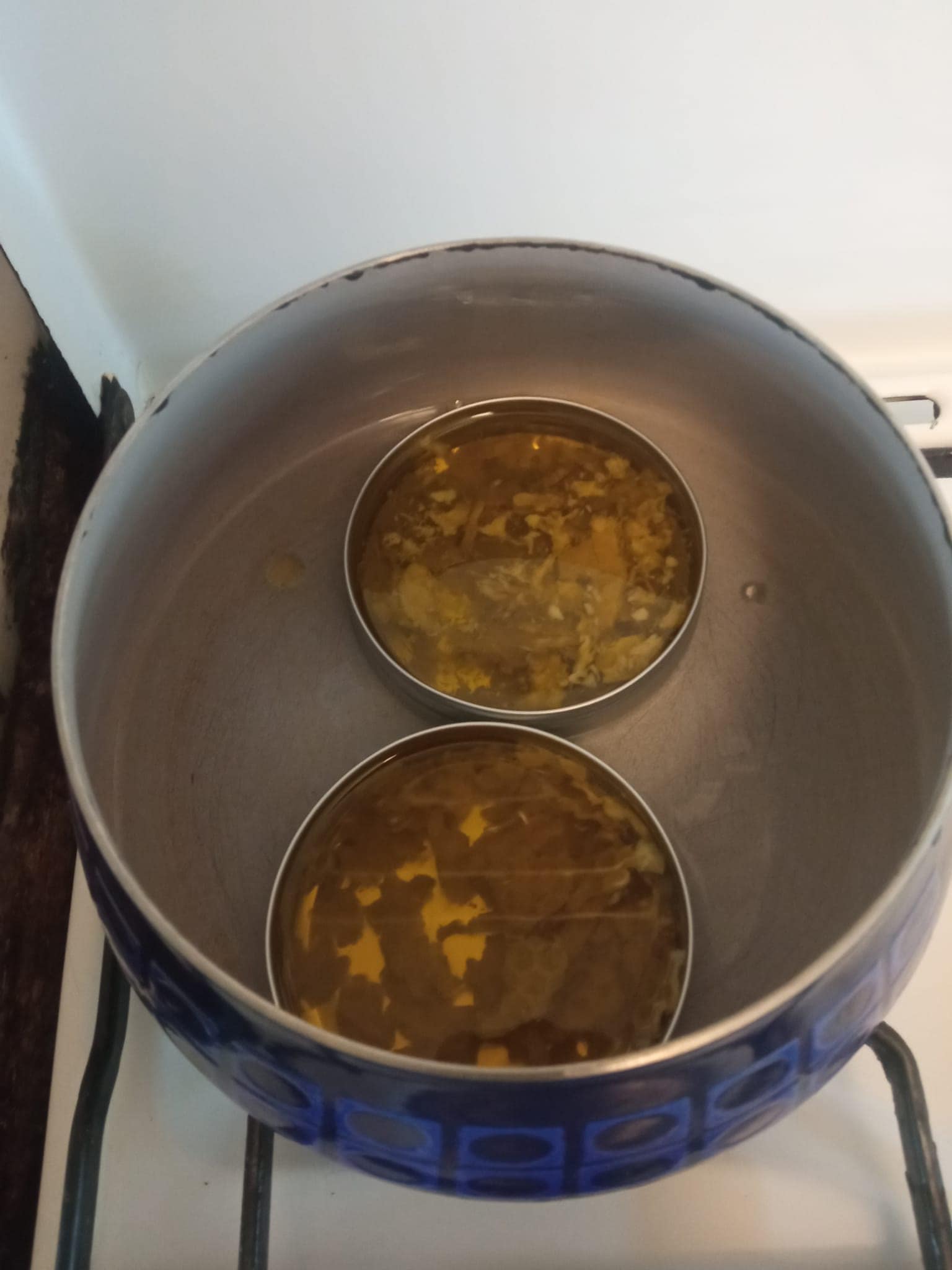 Place salve in double-boiler and add beeswax
