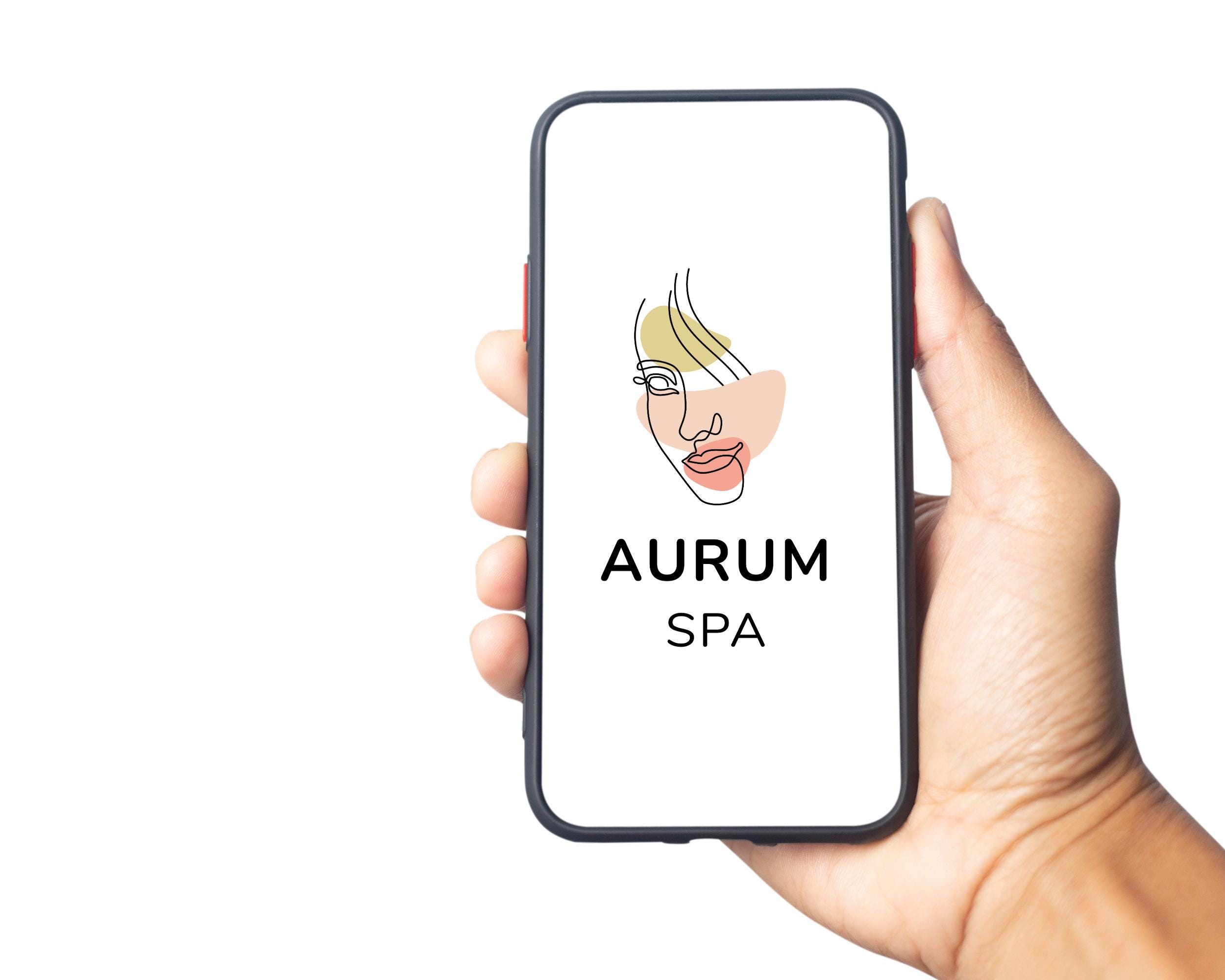 Minimalist one-line woman face logo design for Aurum Spa, featuring boho abstract colors in beige, blush, and gold tones.