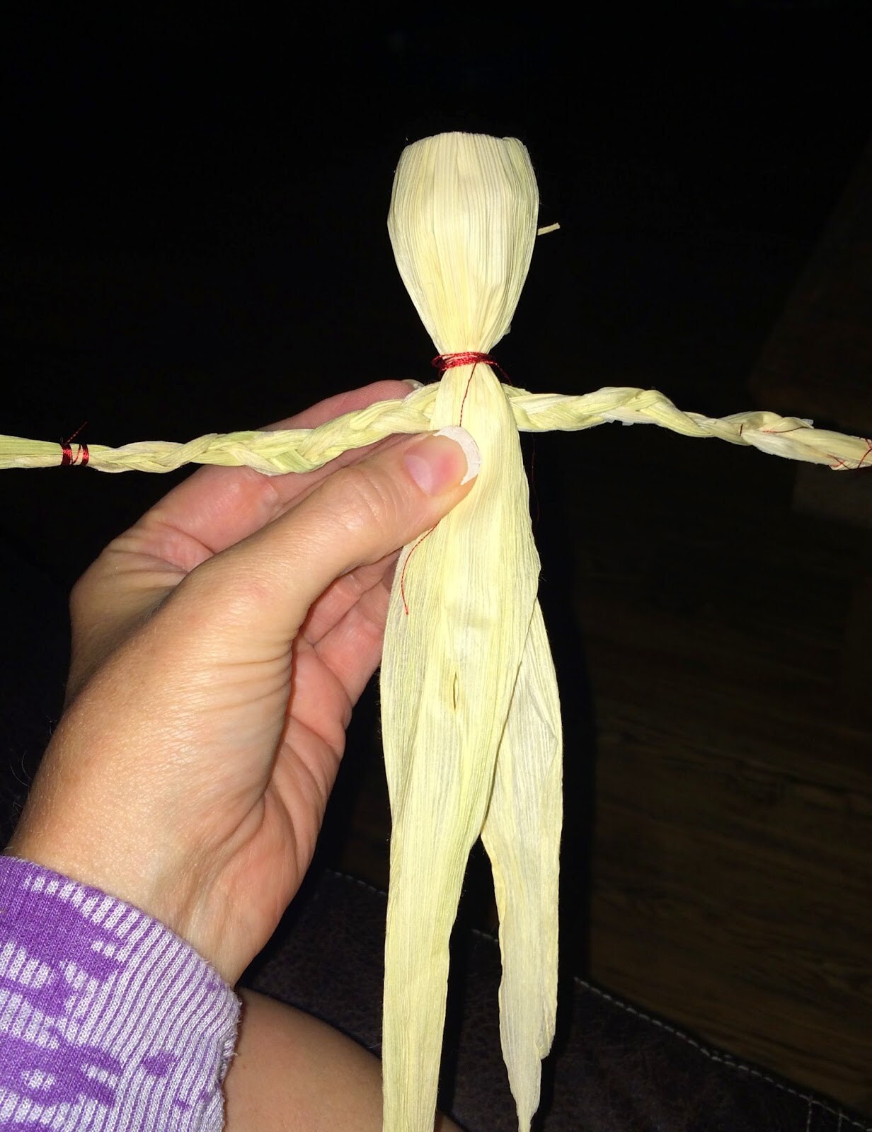 Braided arms slid between the body husks and centered