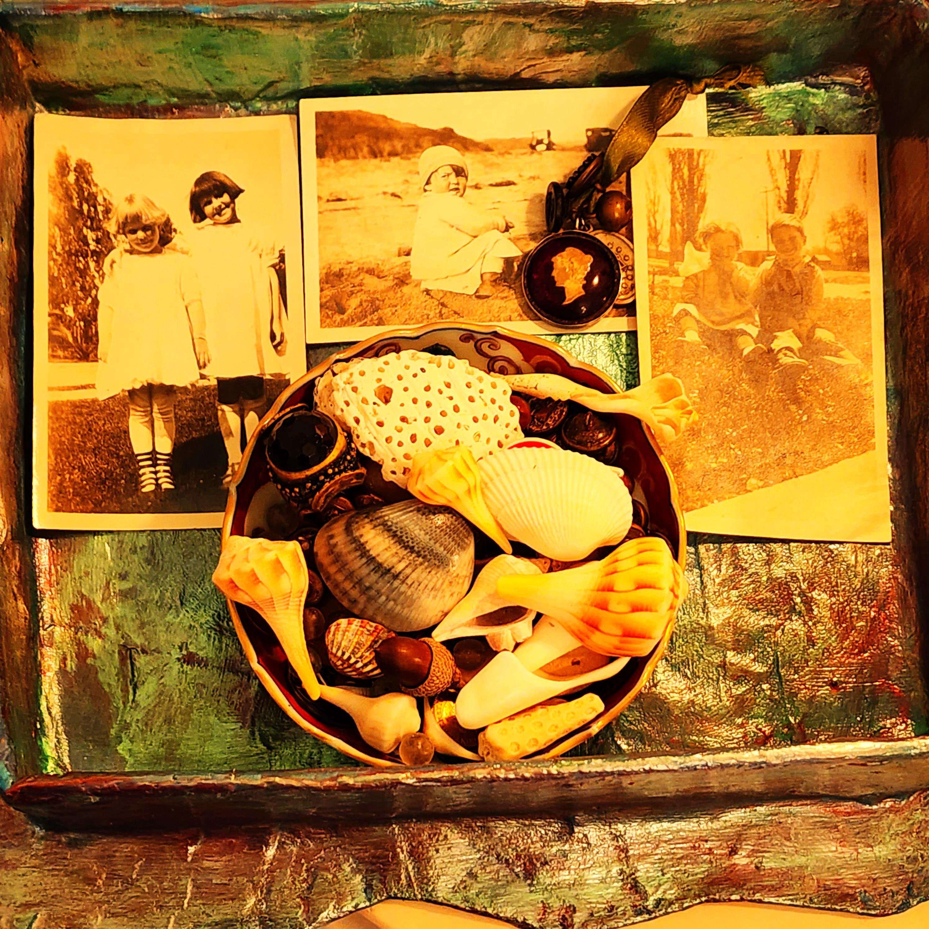 photo collage of ancestors and trinkets to muse over