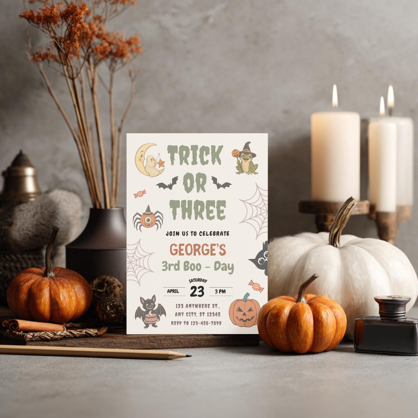 Trick or Three third birthday invitation mockup with playful Halloween details, pumpkins, ghosts, and festive seasonal colors.