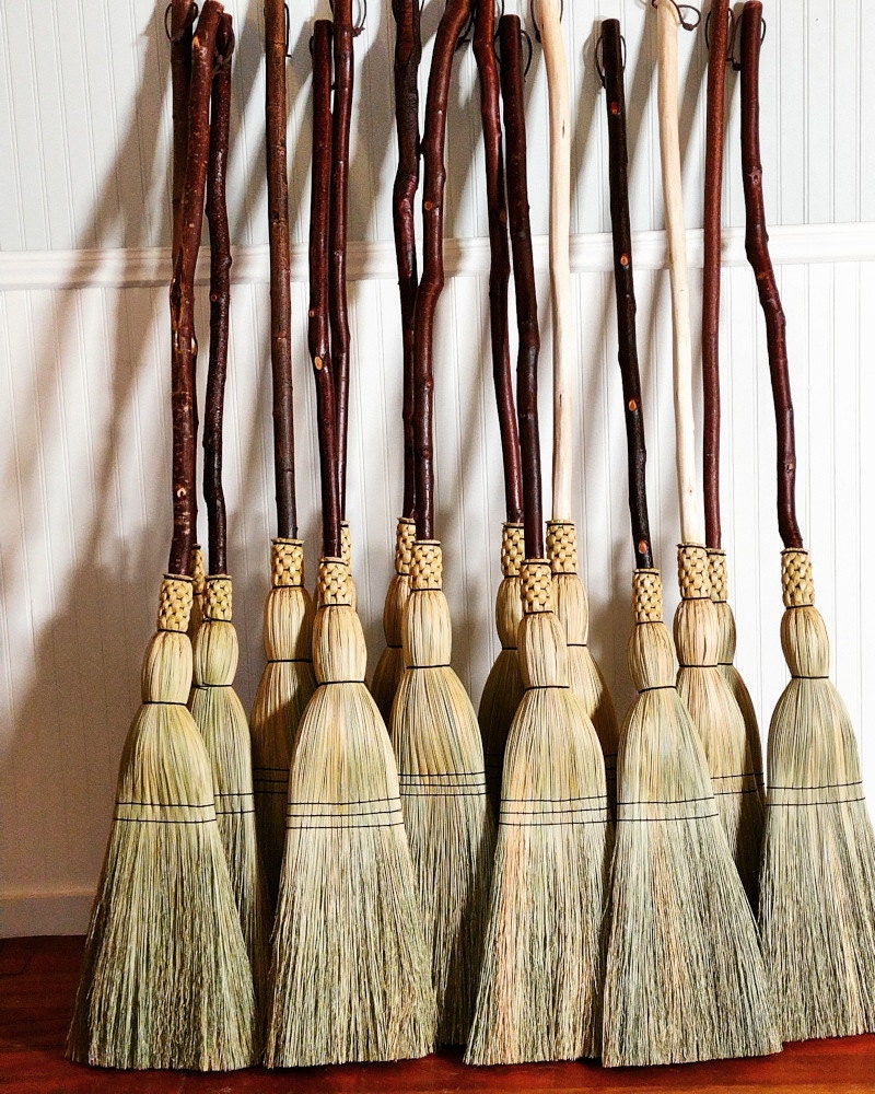 New woven porch and kitchen brooms