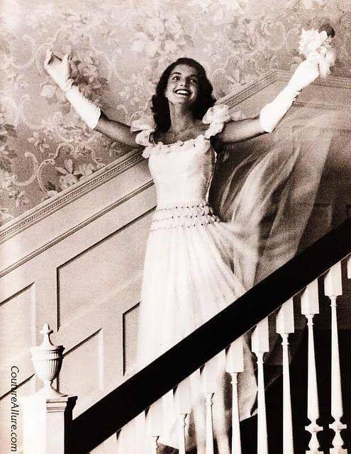 DEBUTANTE OF THE YEAR 1947  Do you recognize her? Its Jacqueline Bouvier wearing a $59 off-the-rack dress in 1947. In 6 years, she would be the wife of Senator John F. Kennedy; and in another 7, she would be First Lady. Do you think she had any idea of what was to come behind that smile?  Note: Jackie is 18 years old in this photo.  (Info courtesy of Couture Allure Vintage Fashion Blog)