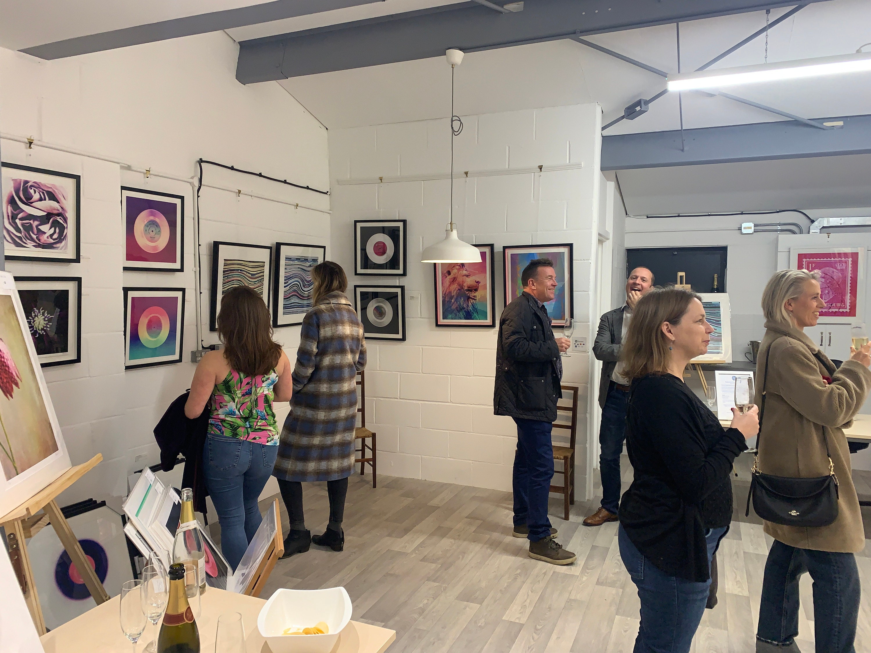 Deborah pendell fine art solo art exhibition at cambridge art cube- people looking at artworks