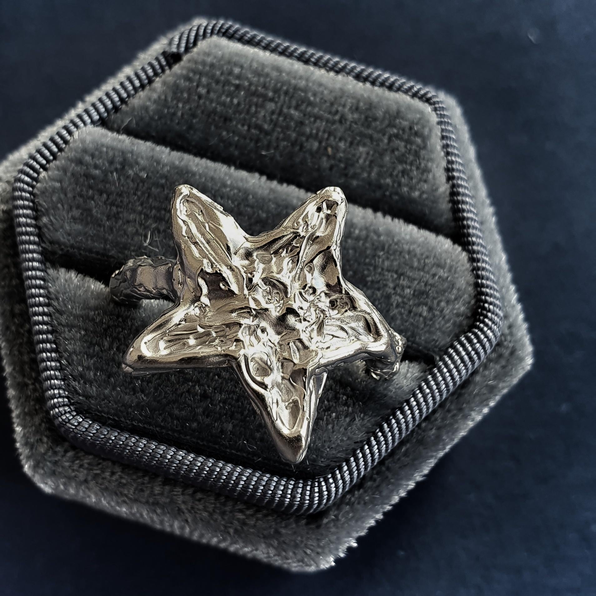 melted silver star ring