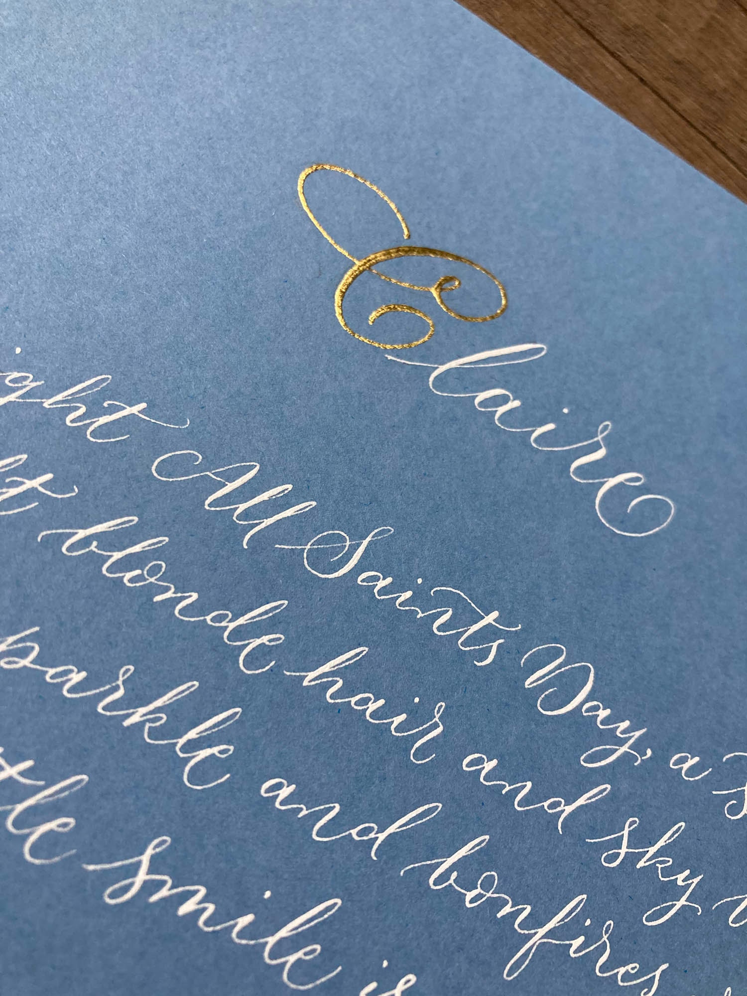 Calligraphy with gold leaf detail for custom commissions