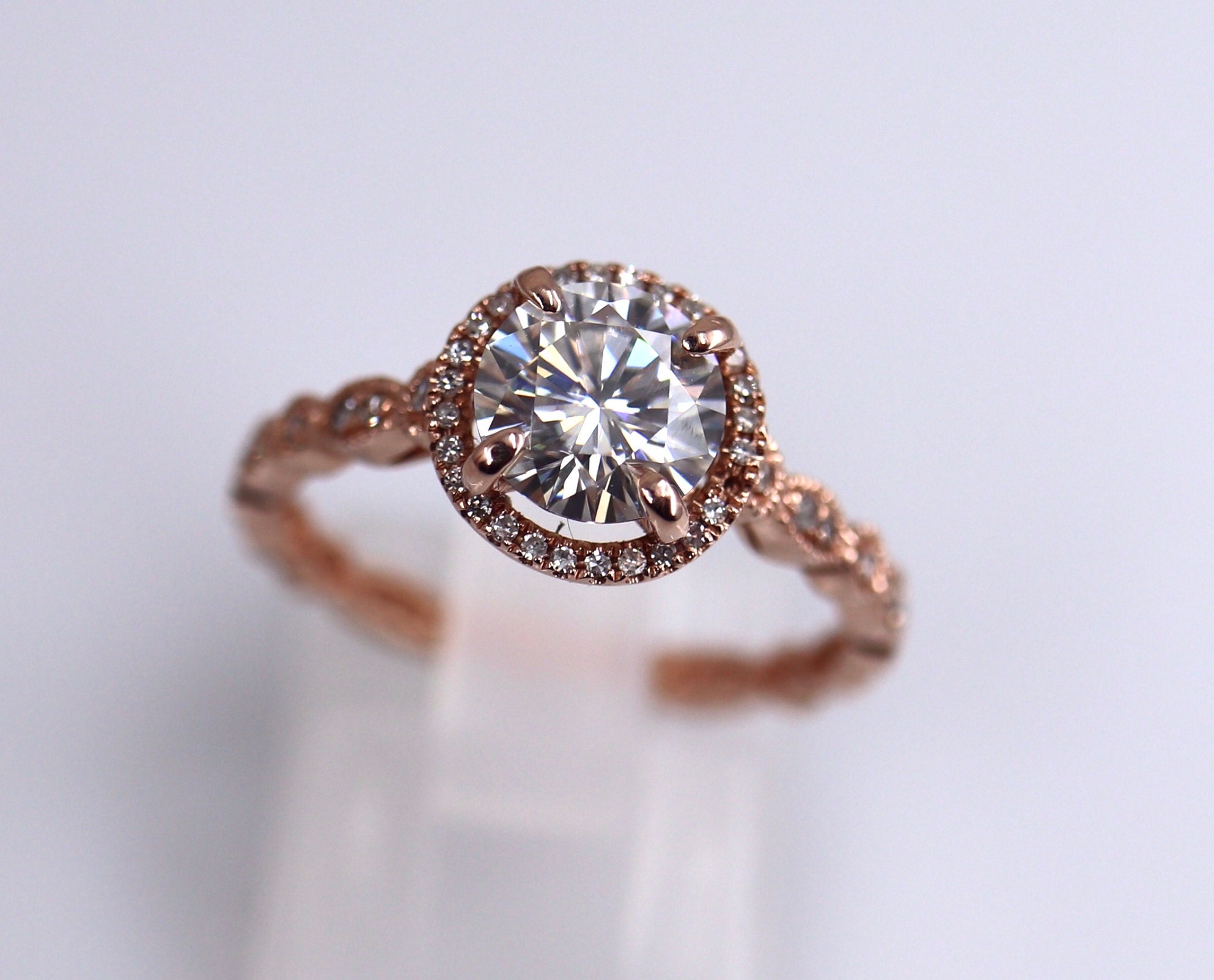 Halo Art Deco 7mm round def ring rose gold. Stunning! And sold!