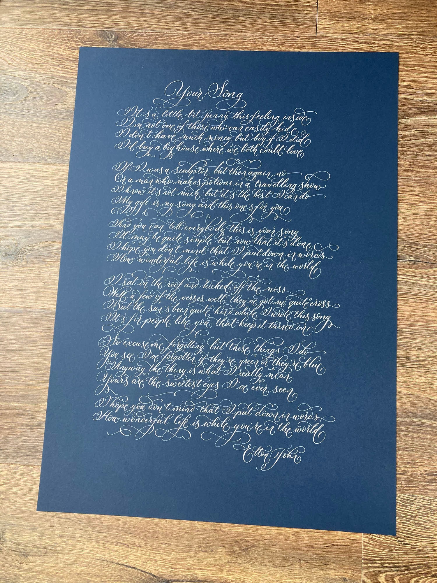 Elton John your song lyrics in calligraphy