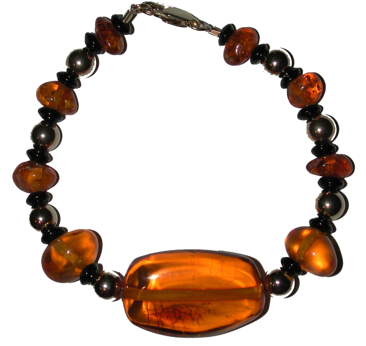 Leo Astrology Bracelet with genuine Polish amber, onyx and 14K Gold