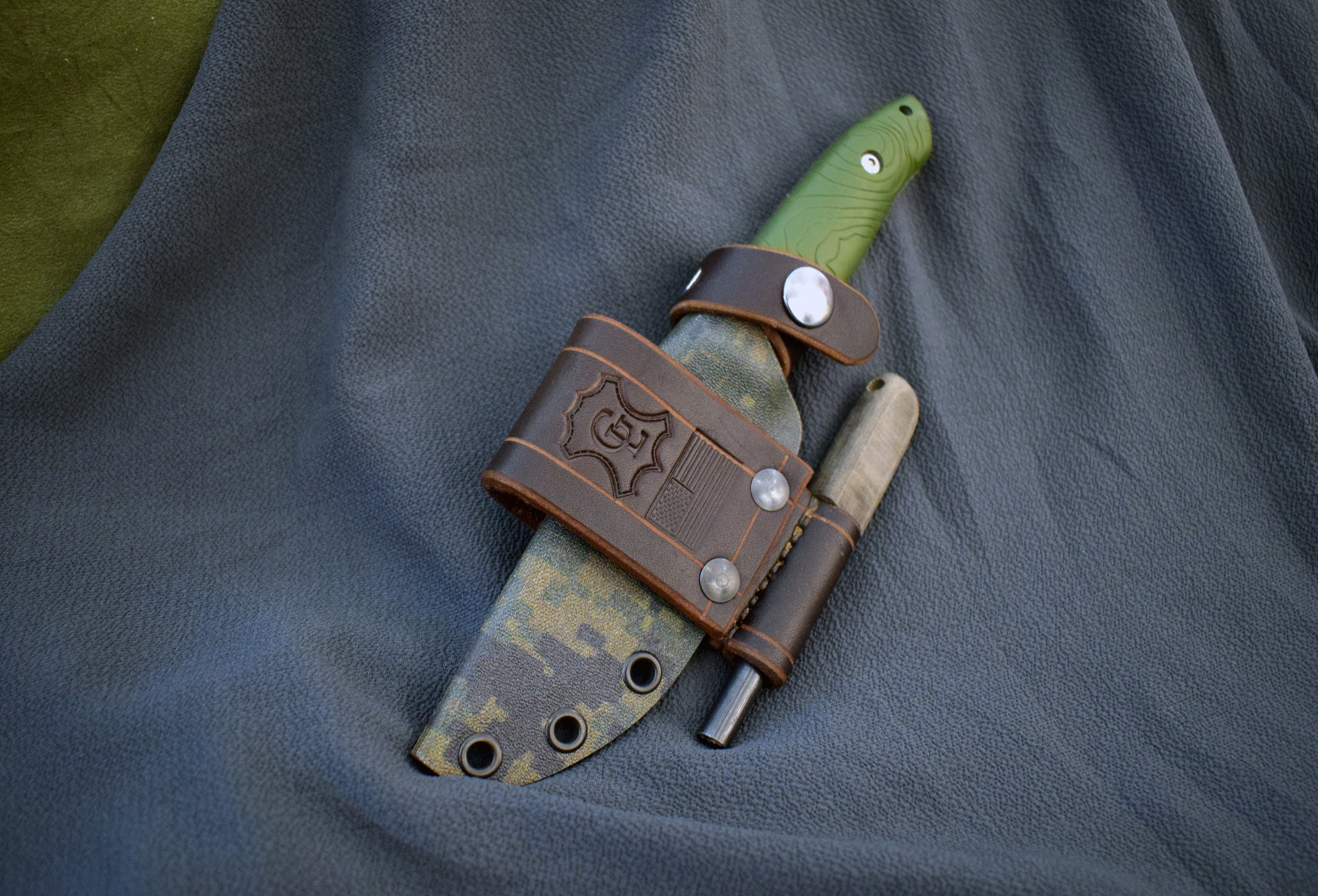 A camo pattern kydex sheath