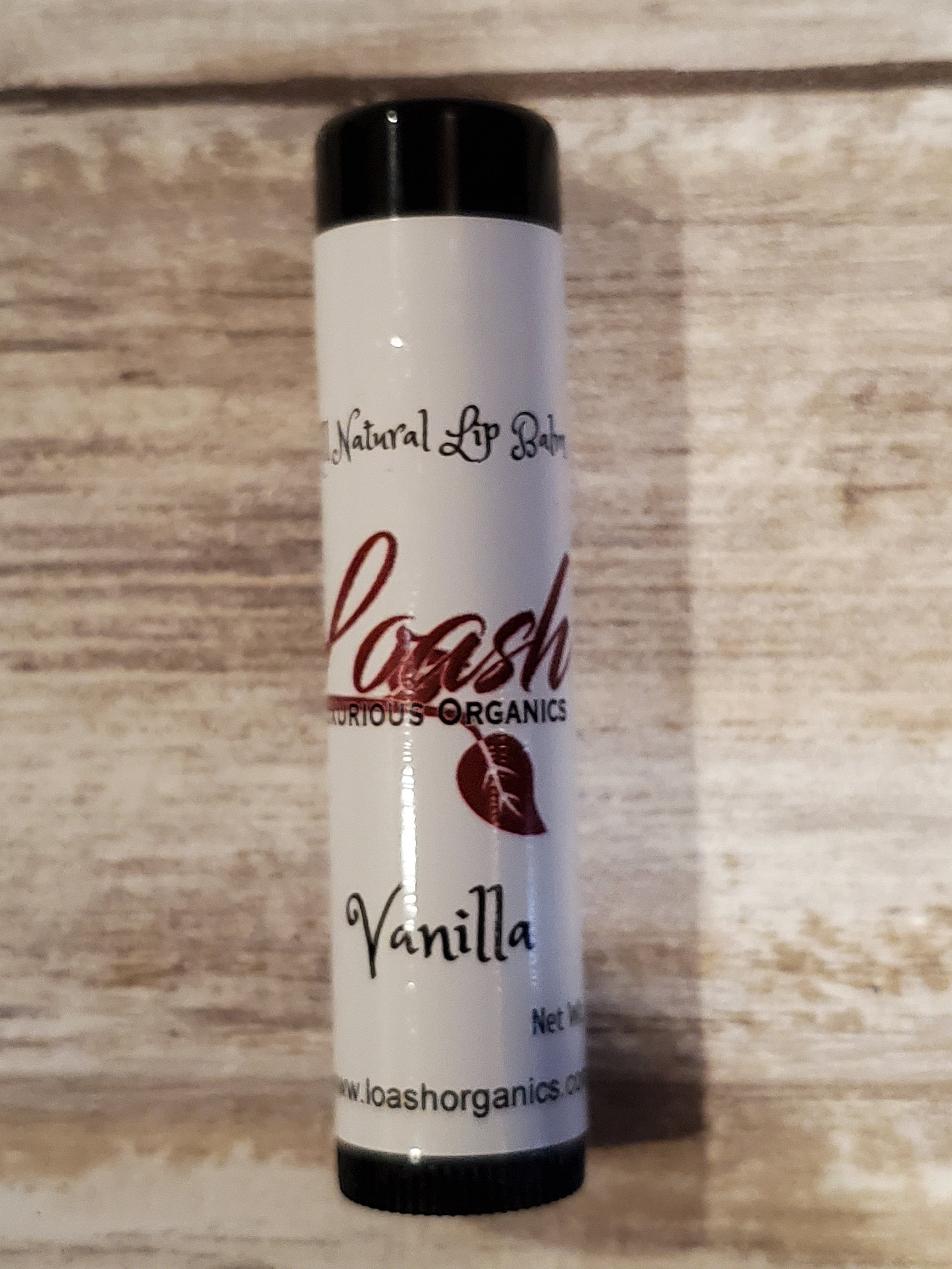Loash Vanilla Lip Balm  Loash Vanilla Chapstick is an amazing all natural formula. They smell absolutely amazing and make your lips very soft. They apply silky smooth and not waxy and last a very long time. #teamloash  .15 oz