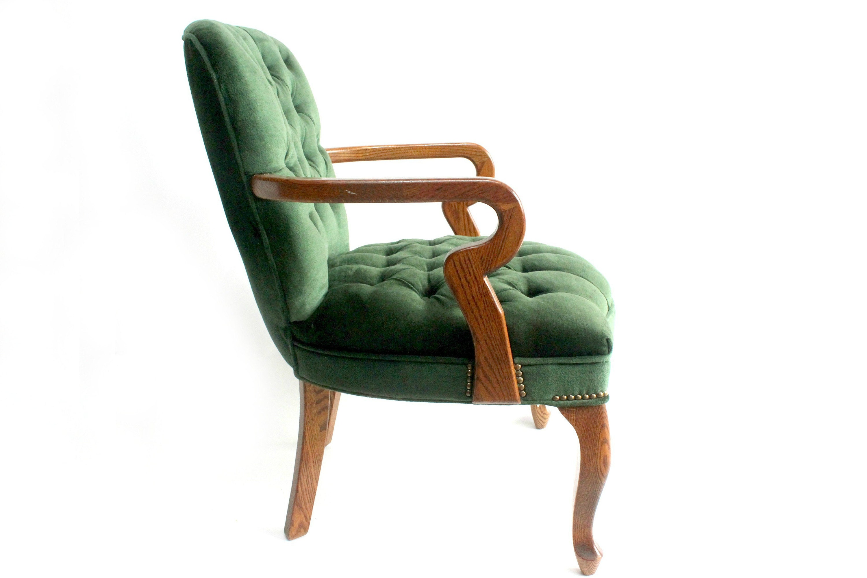 tufted green club chair