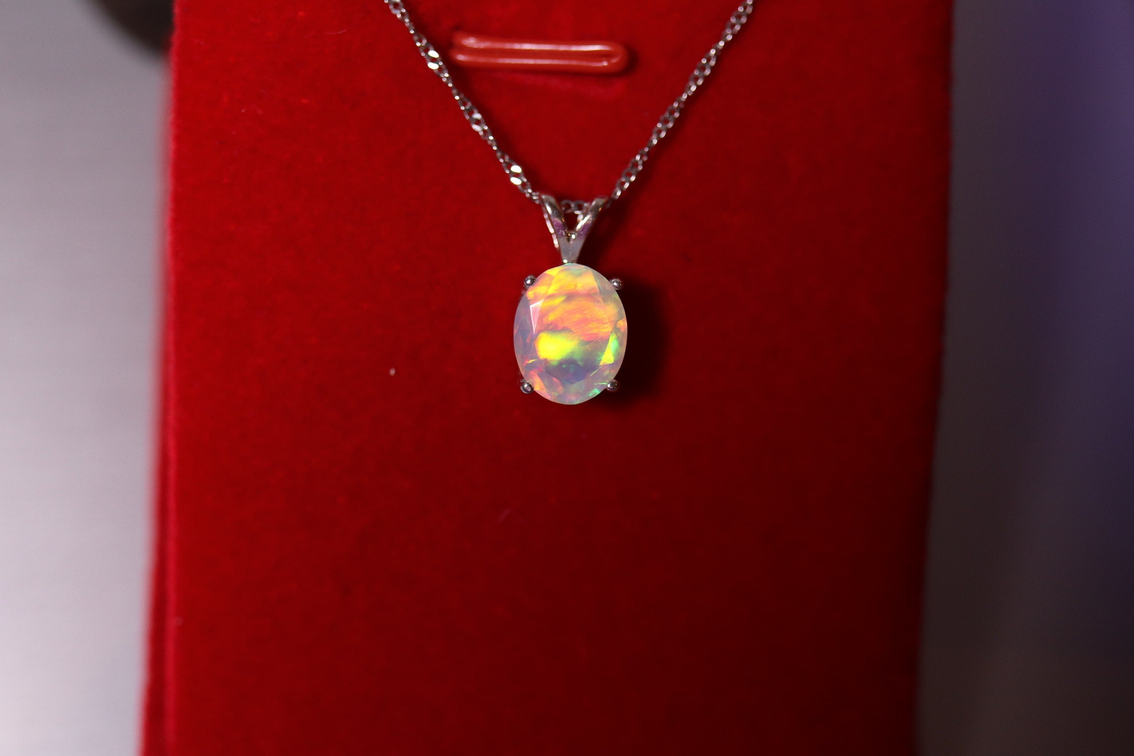 10x8mm faceted opal- look how it glows!