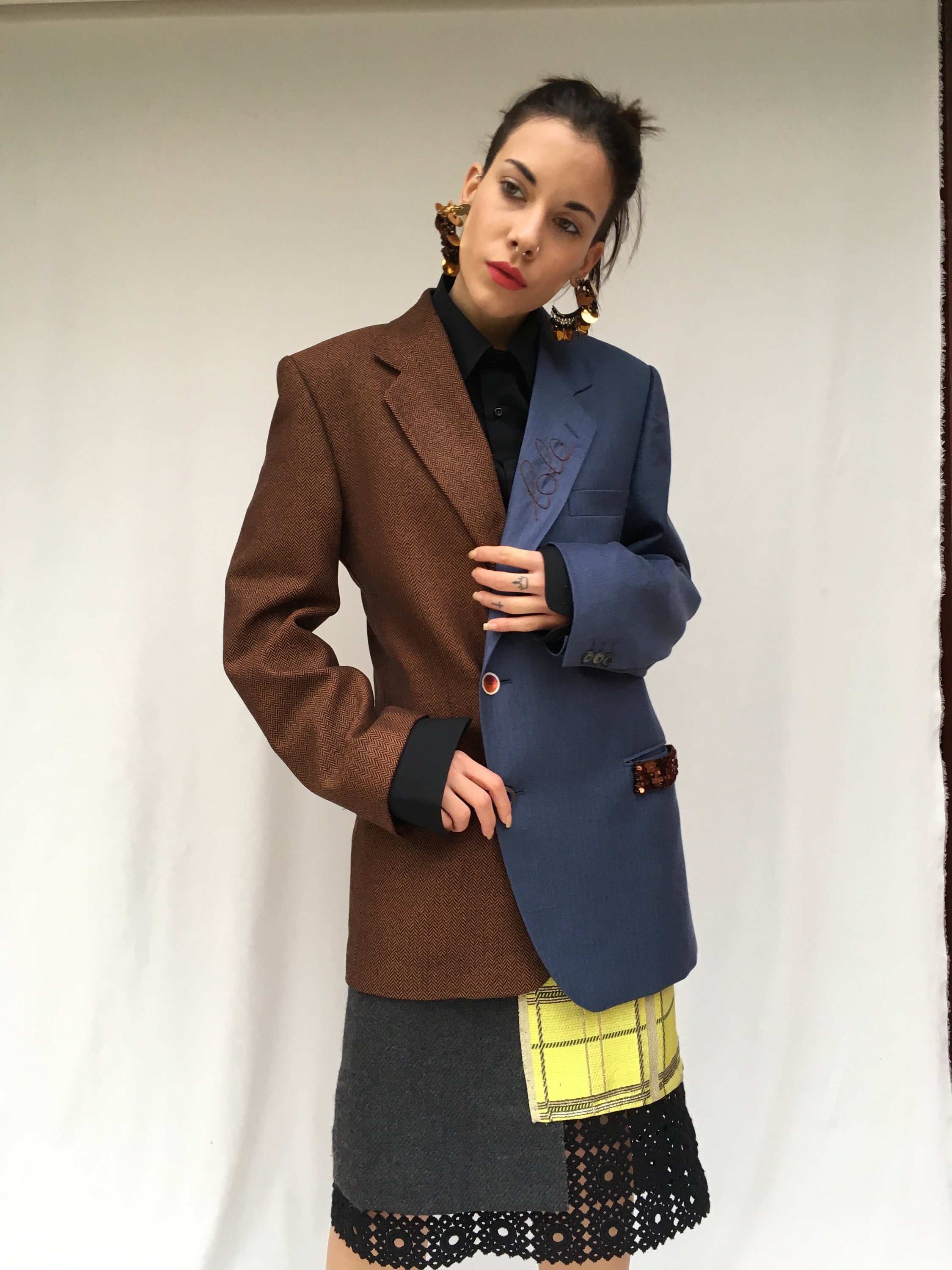 deconstructed skirt and jacket from selected vintage items. sustainability in the creative recovery of high quality waste clothing