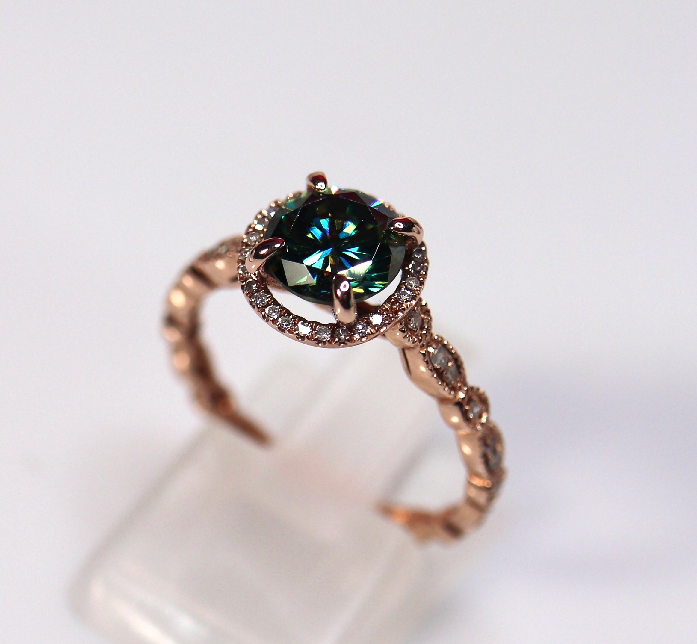 Art Deco halo in dark blue green