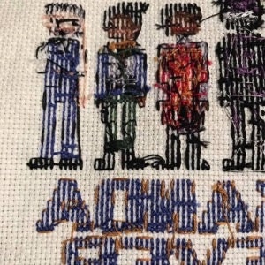 reverse side of cross stitch