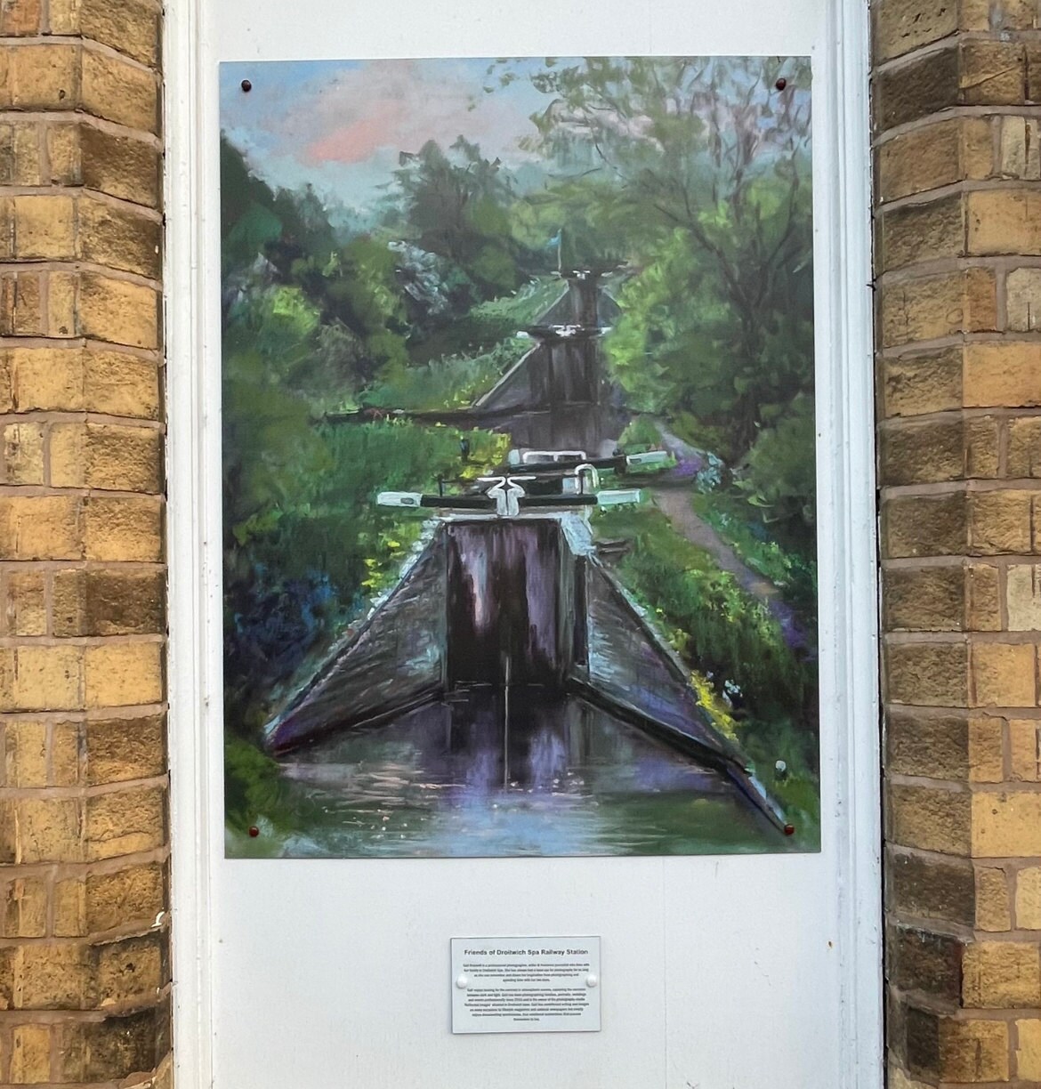 Filght of canal locks image in a window recess