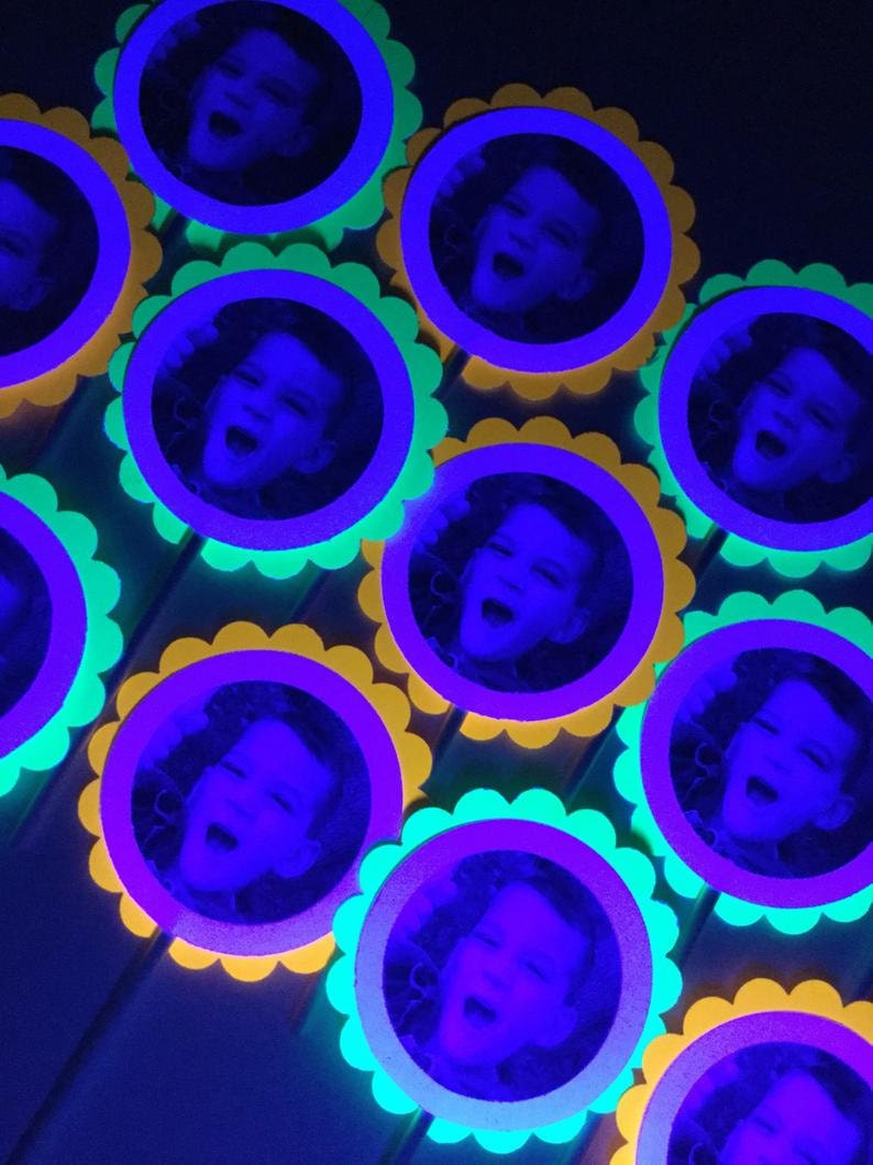 fluorescent neon cupcake toppers with picture of boy