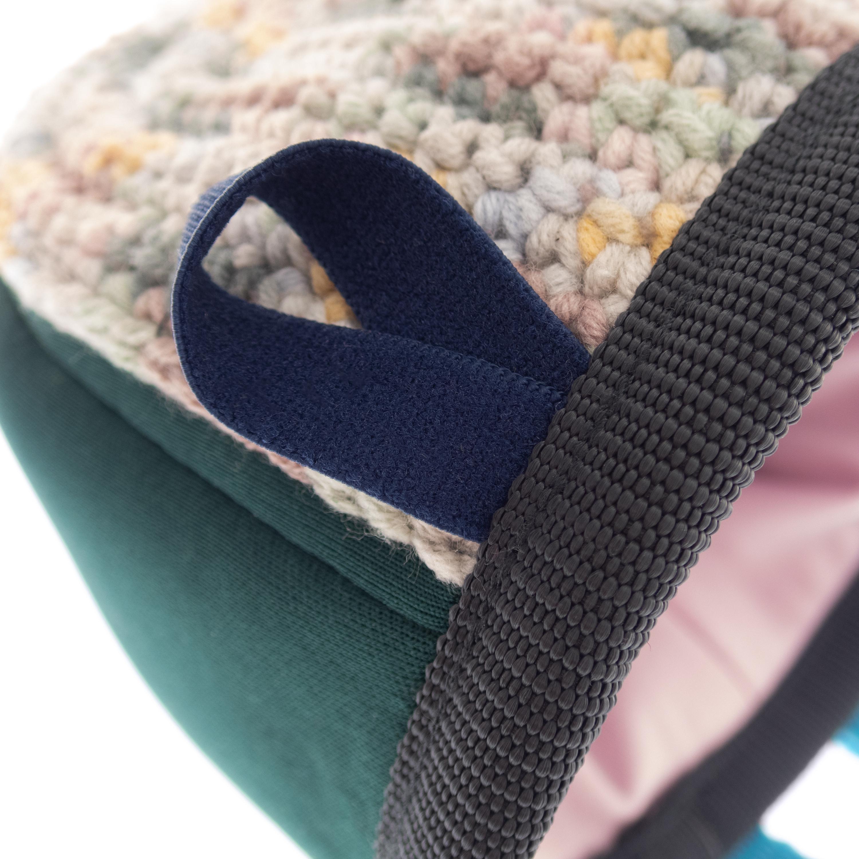 Small climbing chalk bag for young athletes with comfortable fit and practical design.