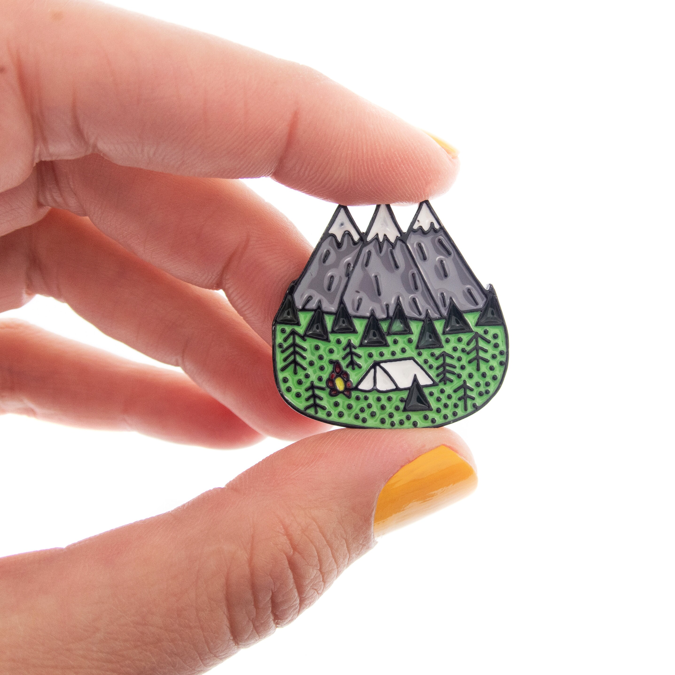 mountain brooch enamel pin with snowy mountain and a tent