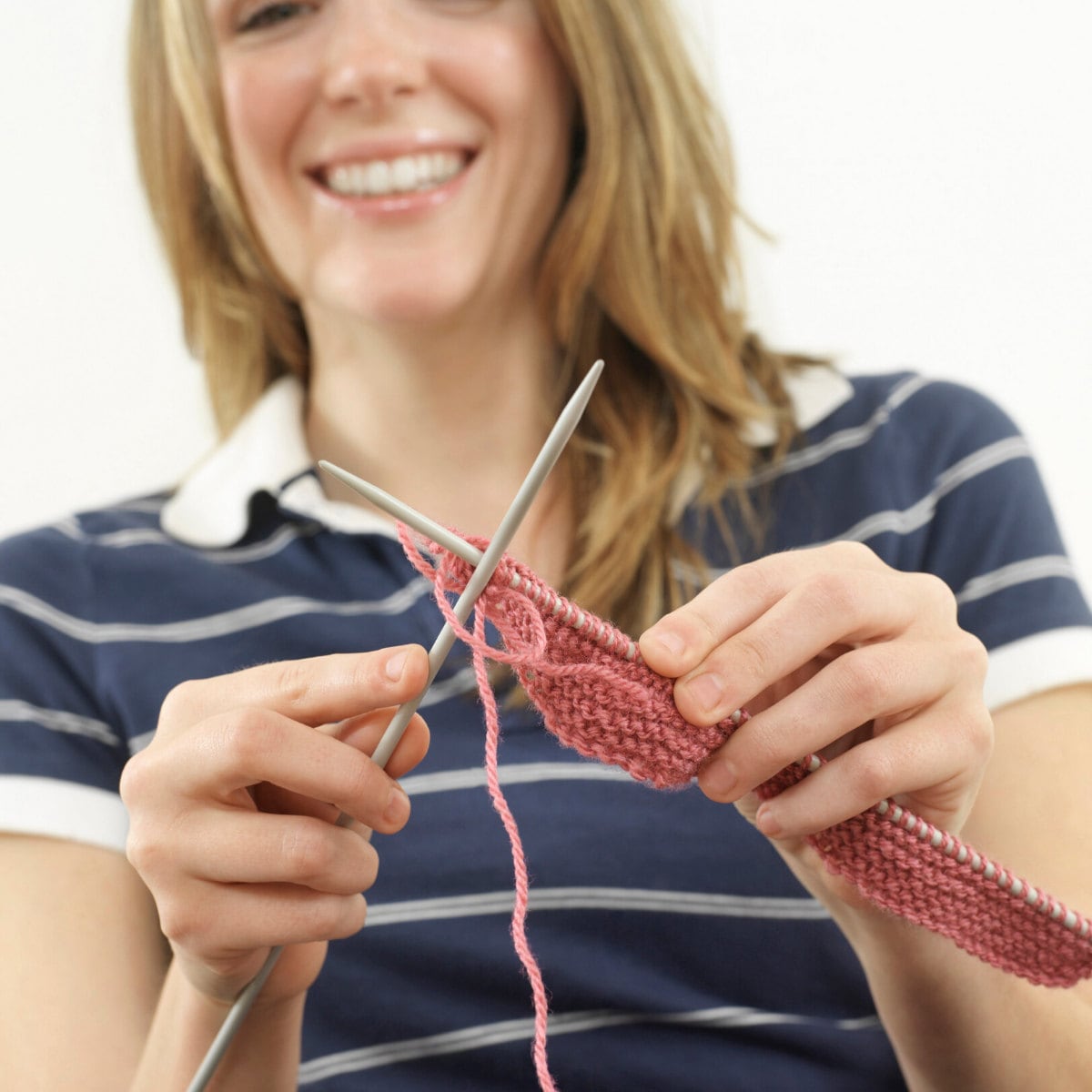 woman is knitting