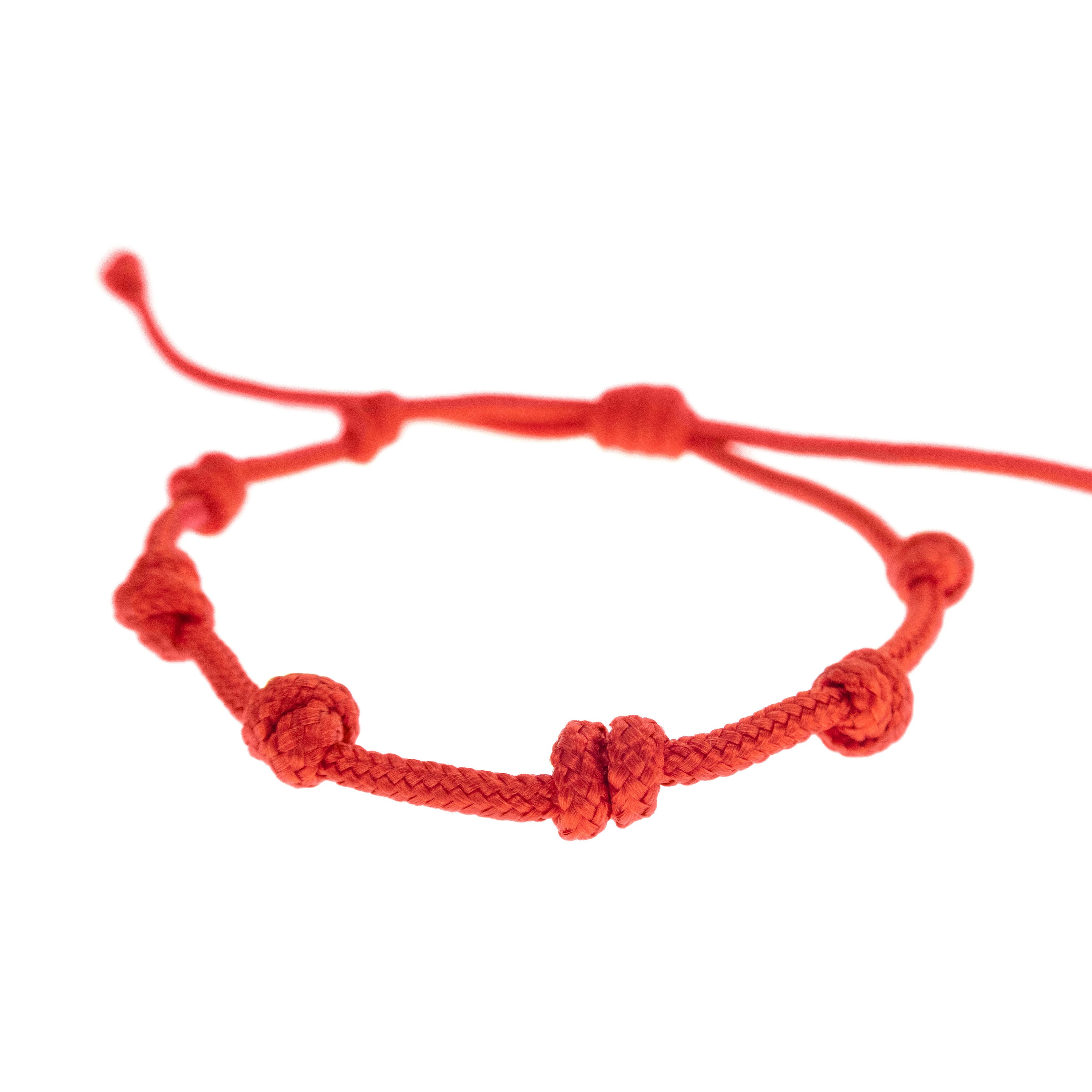 handmade red string bracelet with 7 knots