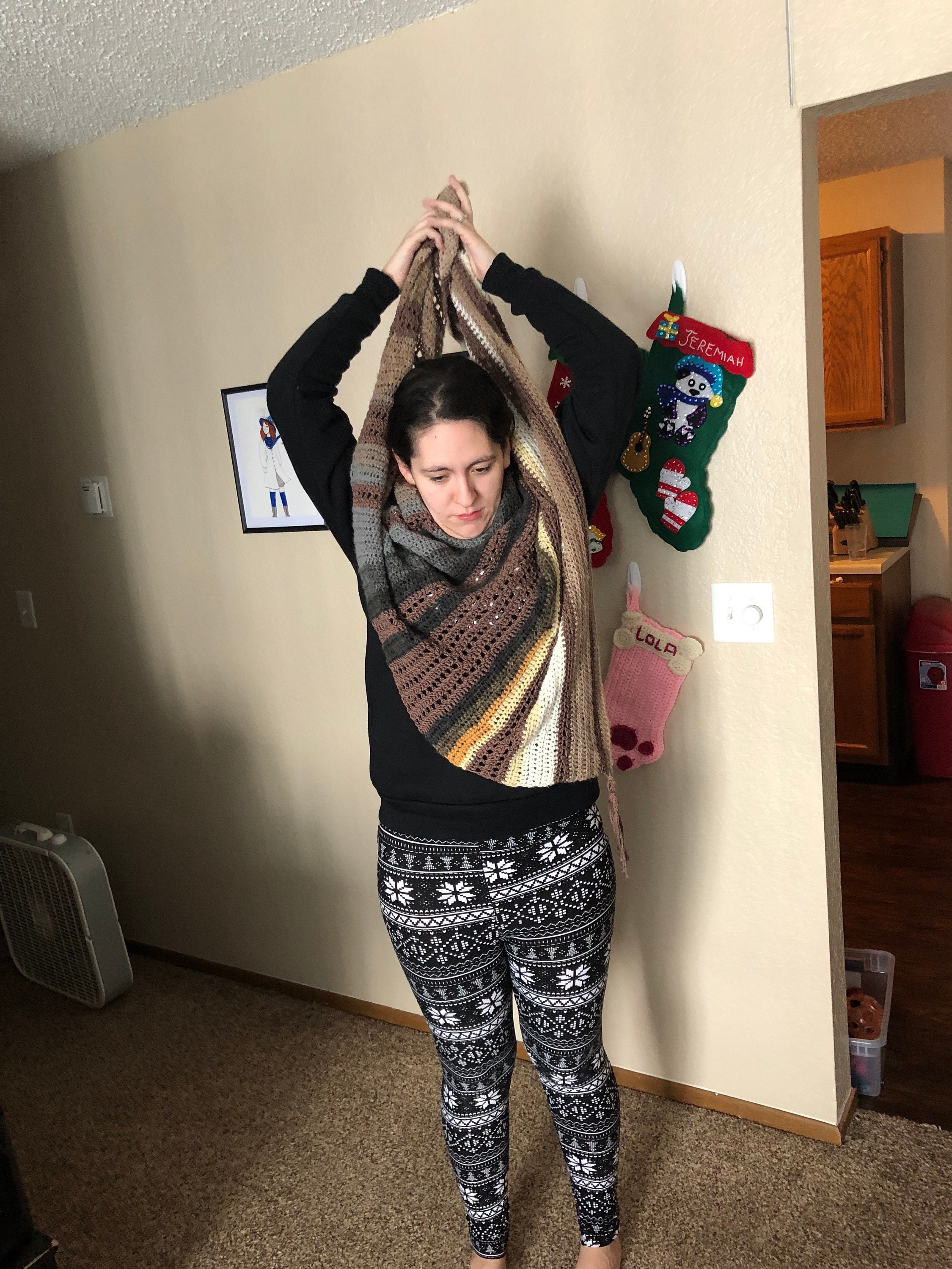 Woman wearing crochet scarf
