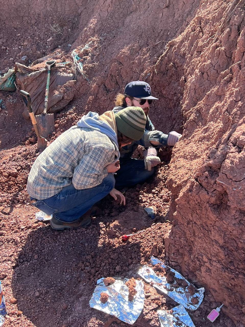 My husband digging in the Texas Red Beds with Whiteside volunteer Mckinzi.