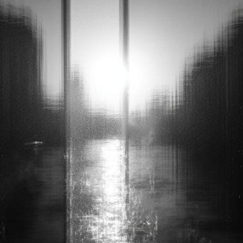 Abstract view of Nordic light and shadow seen through a window, reflecting the relationship between light, darkness, and space.