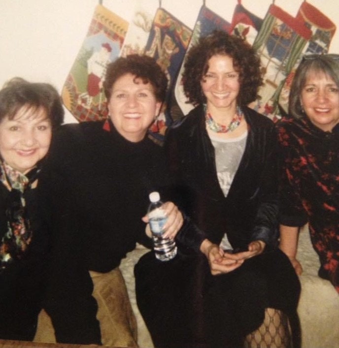 With my sisters one Christmas Past, me wearing Ecuador trade bead necklace that I sold in my shop.