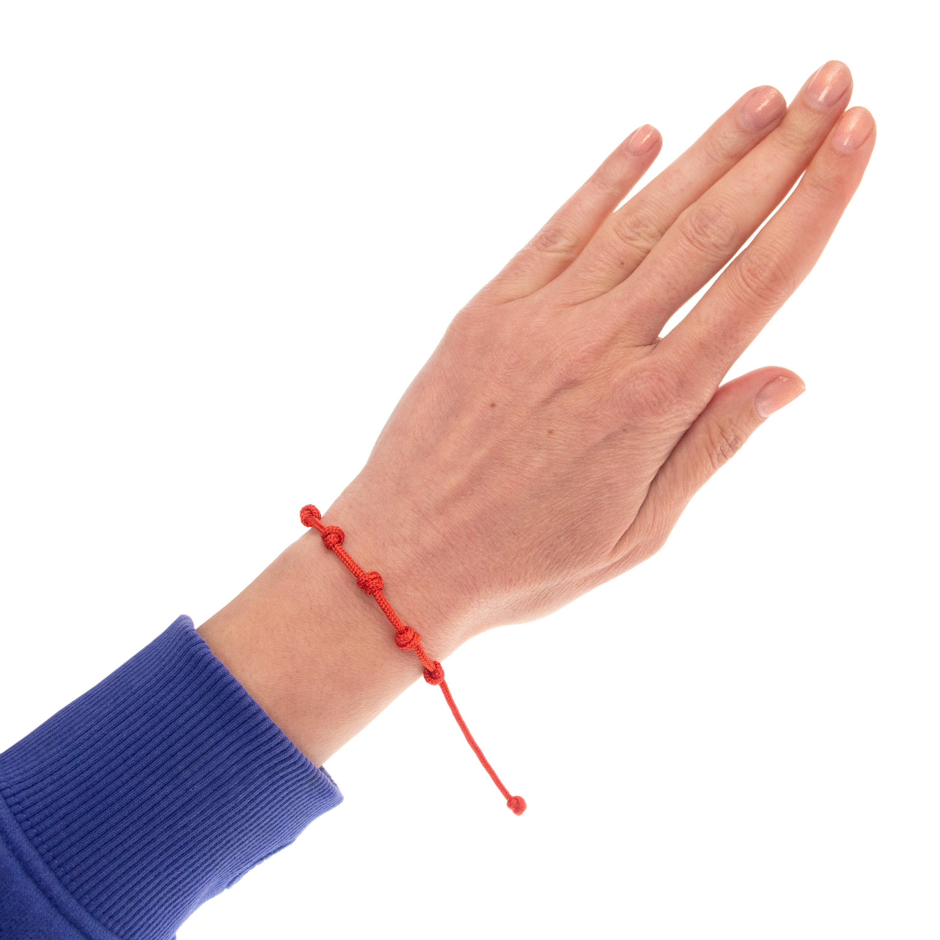 handmade red string bracelet with 7 knots