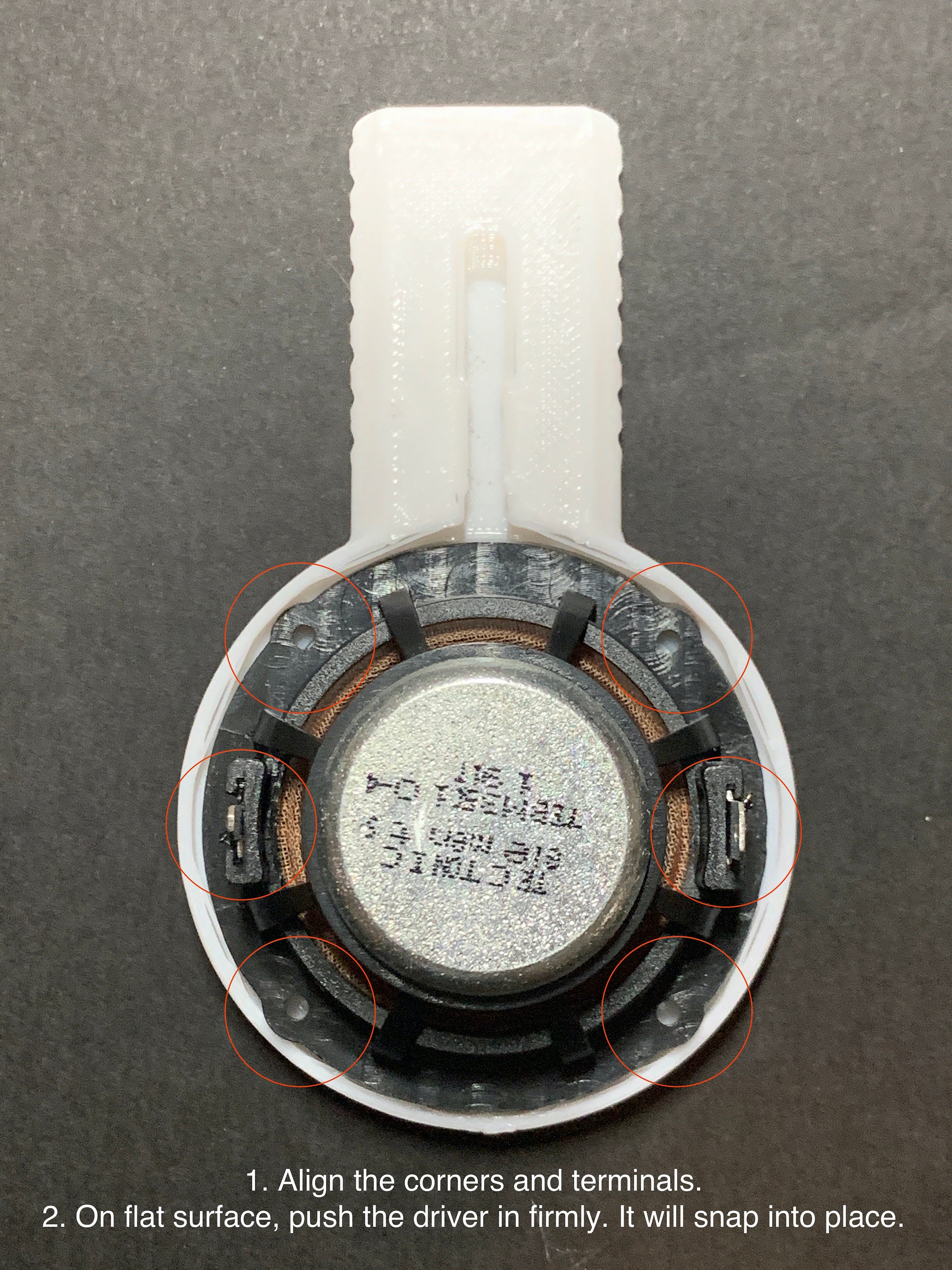 1. Align the corners and terminals. 2. On flat surface, push the driver in firmly. It should snap into place.
