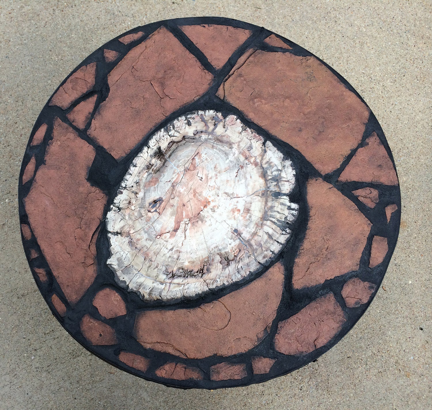 Top view of the table featuring petrified wood from Madagasgar