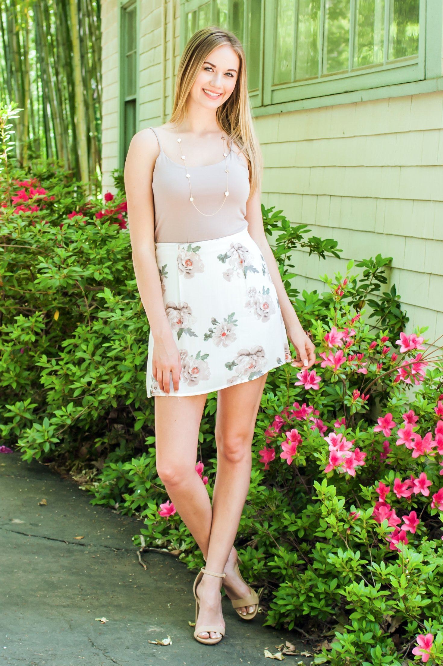 white short skirt on woman for Spring with flowers