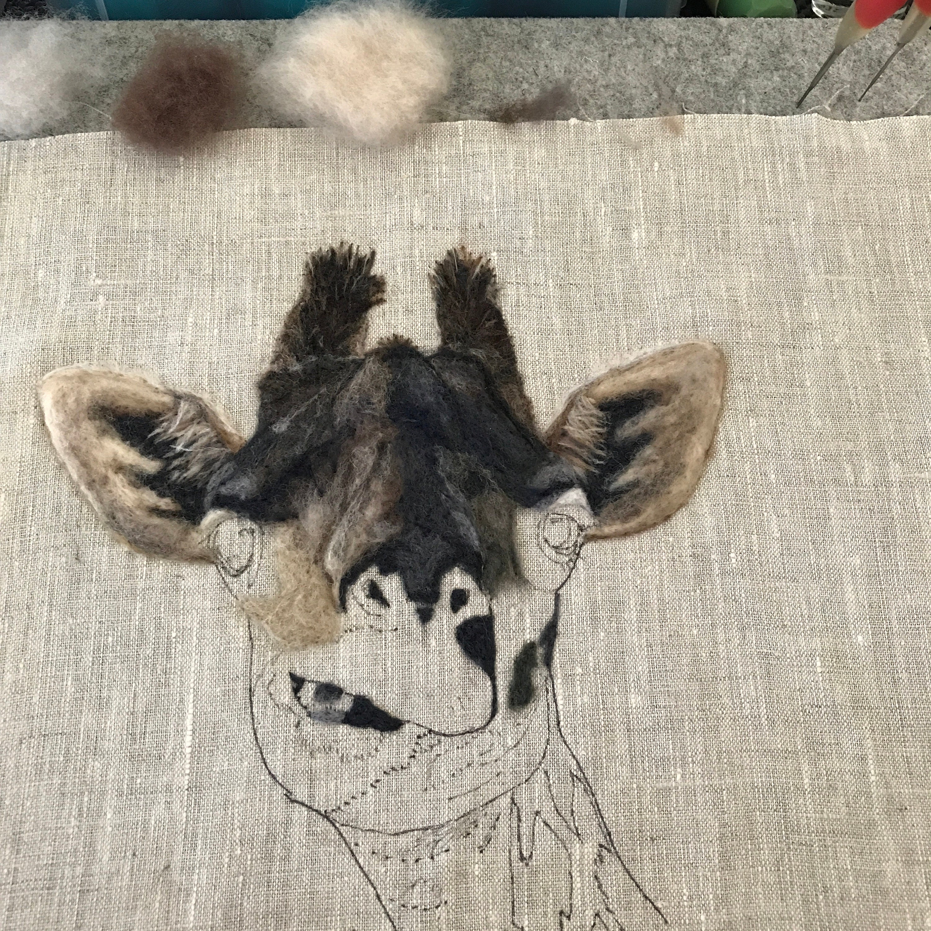 2D needle felt art of a giraffe