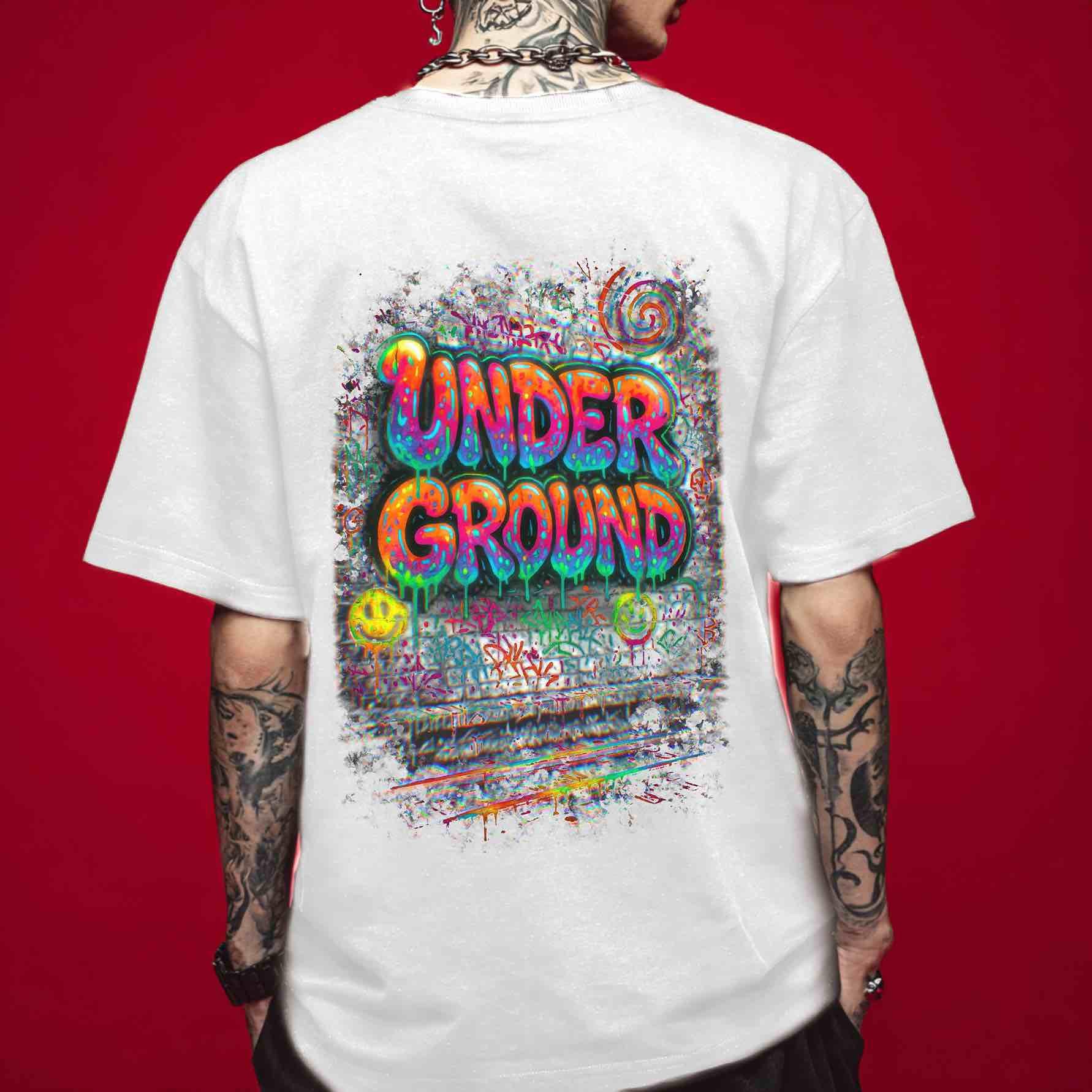 Back view of white unisex t-shirt with ‘UNDER GROUND’ neon graffiti, subway wall and smiley icons—EDM/rave streetwear fit.