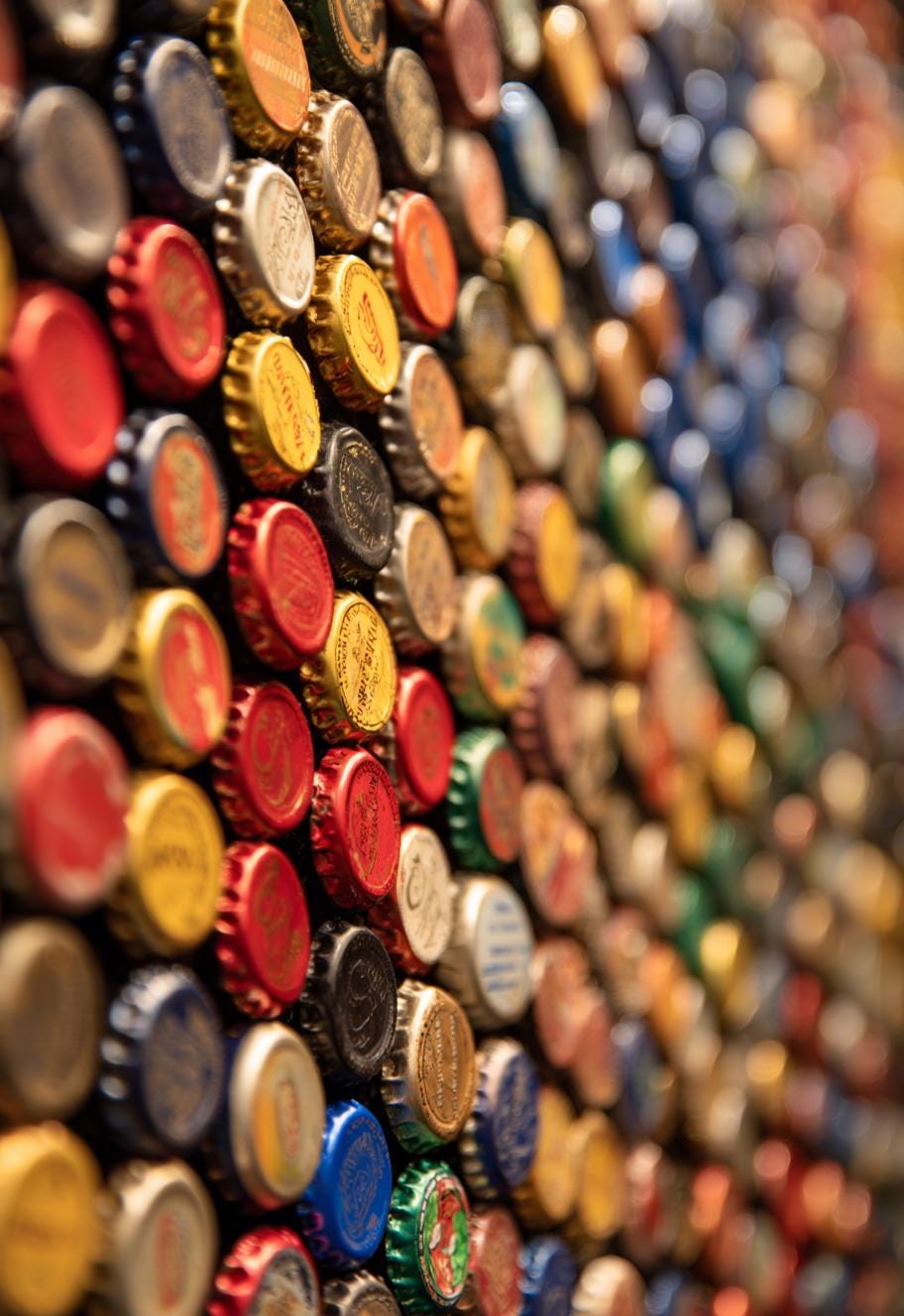 Bottle caps repurposed into upcycld art