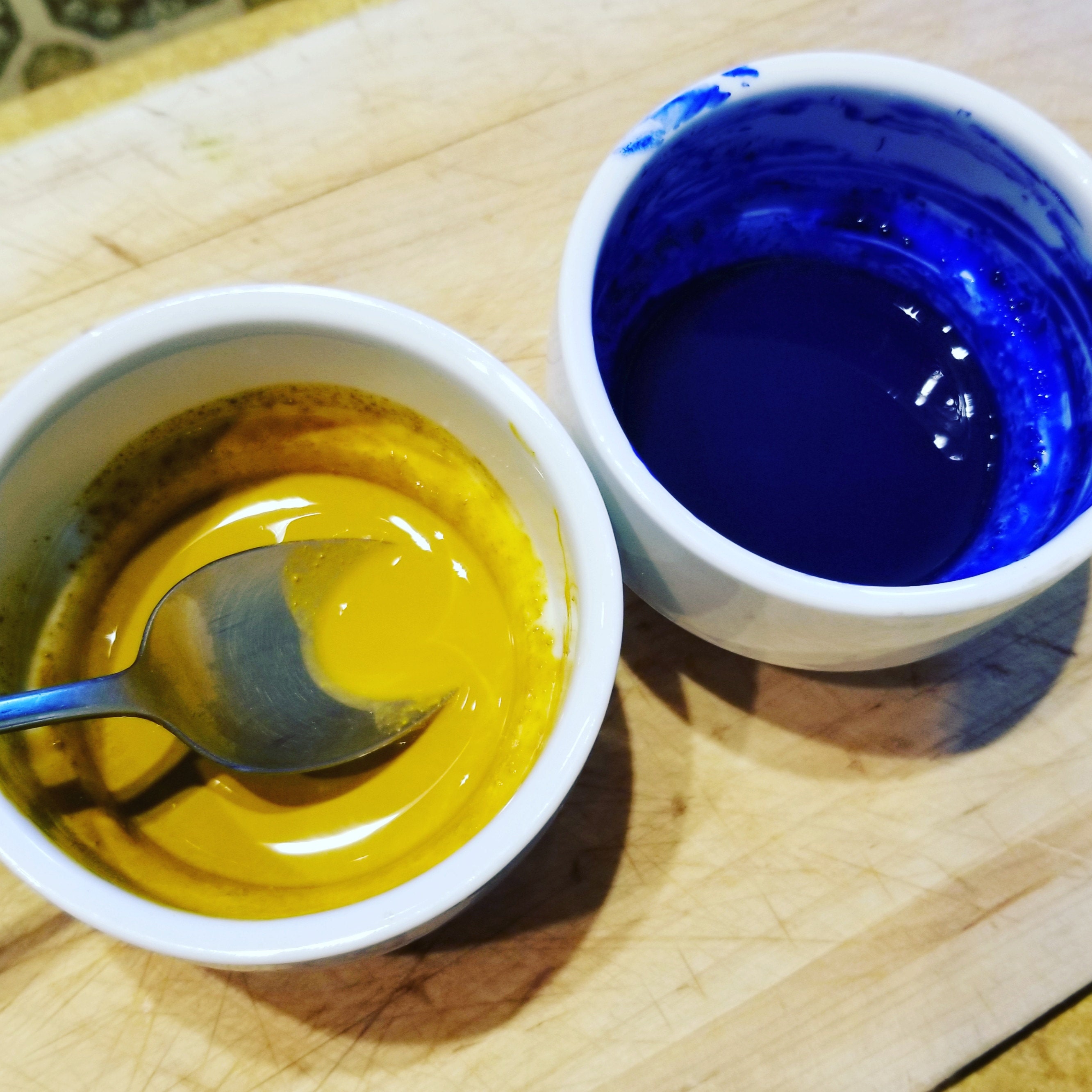 yellow and blue oxides mixed with olive oil