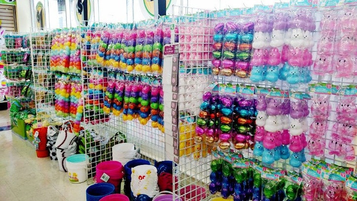 Easter baskets and eggs and toys on shelves at Dollar Tree