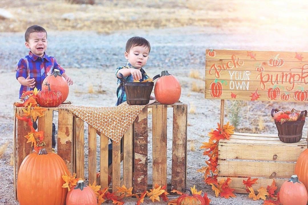 Two kids crying at the pumpkin patch