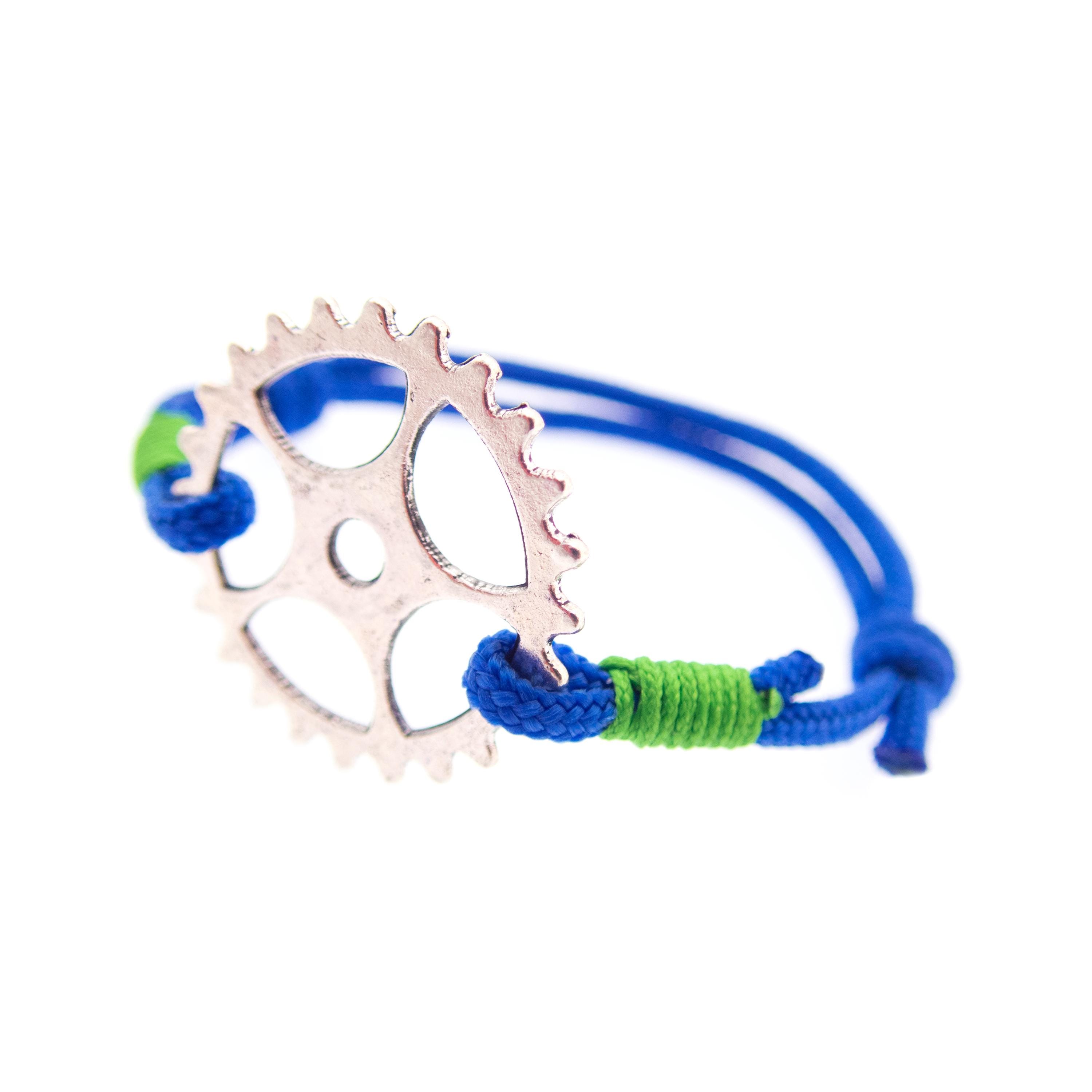 Adjustable blue rope bracelet by Nadamlada, handmade rope string jewelry with metal chainring detail