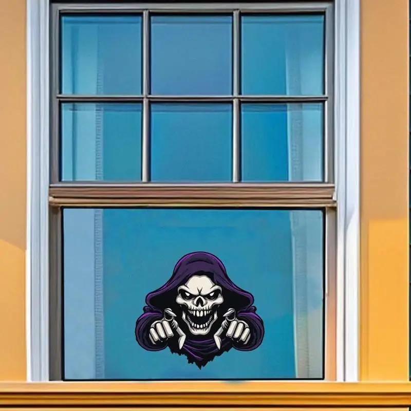 Grim Reaper skull decal on a house window.