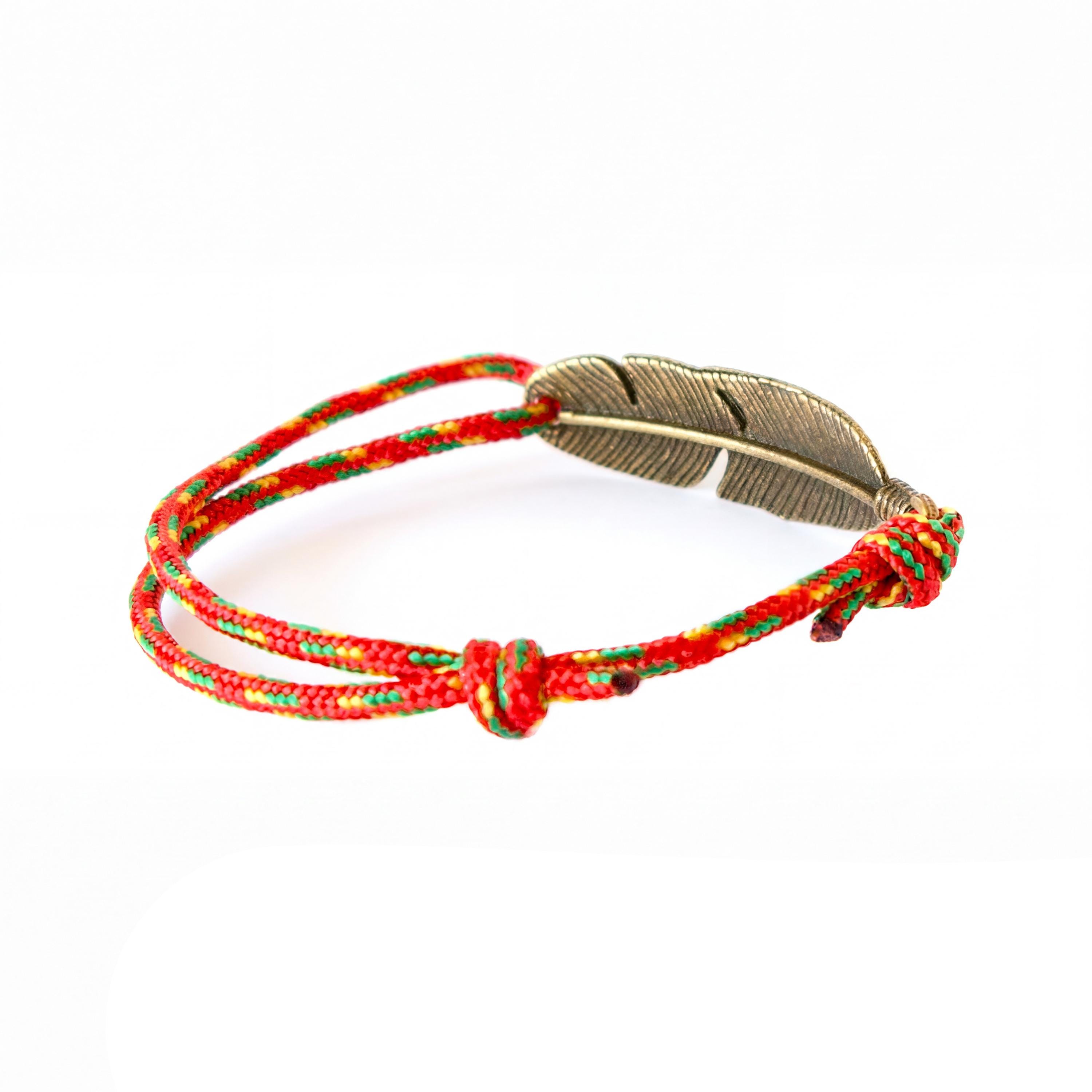 Adjustable rope bracelet with feather charm presented as a meaningful handmade gift for surfers, climbers, and outdoor lovers, ideal for birthdays or travel souvenirs.