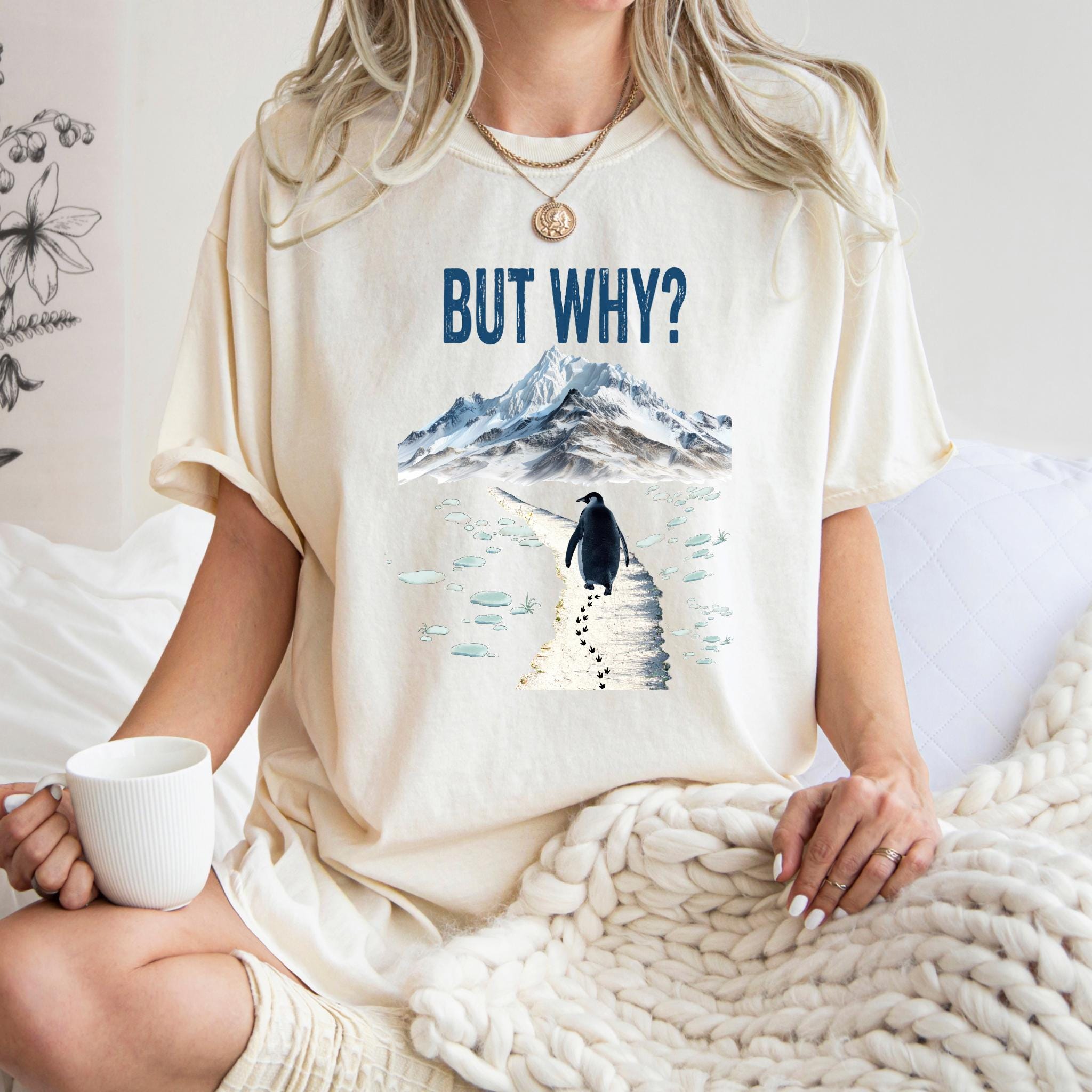 Penguin walking alone away from group with but why text on t shirt
