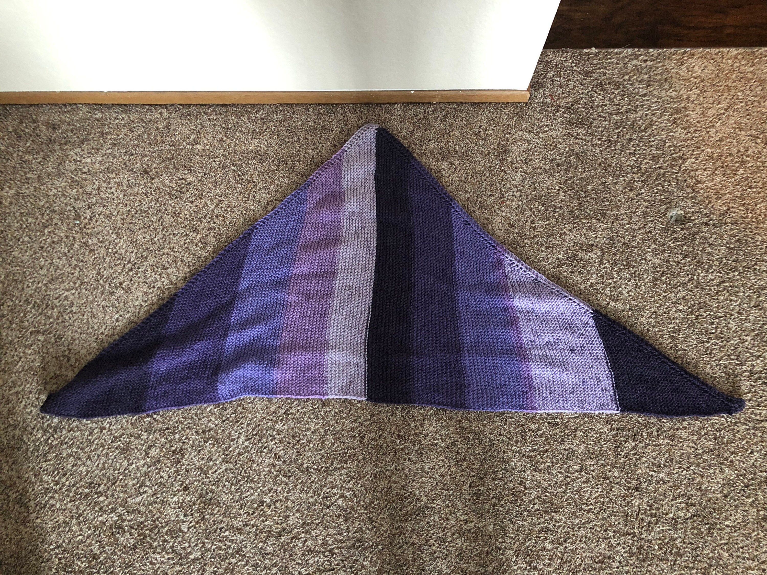 Purple knitted scarf